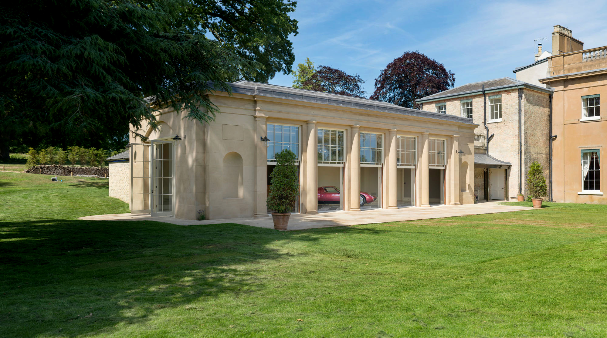 Exclusive Use Manor House in Sibton Park, elegant venue for events with large windows.