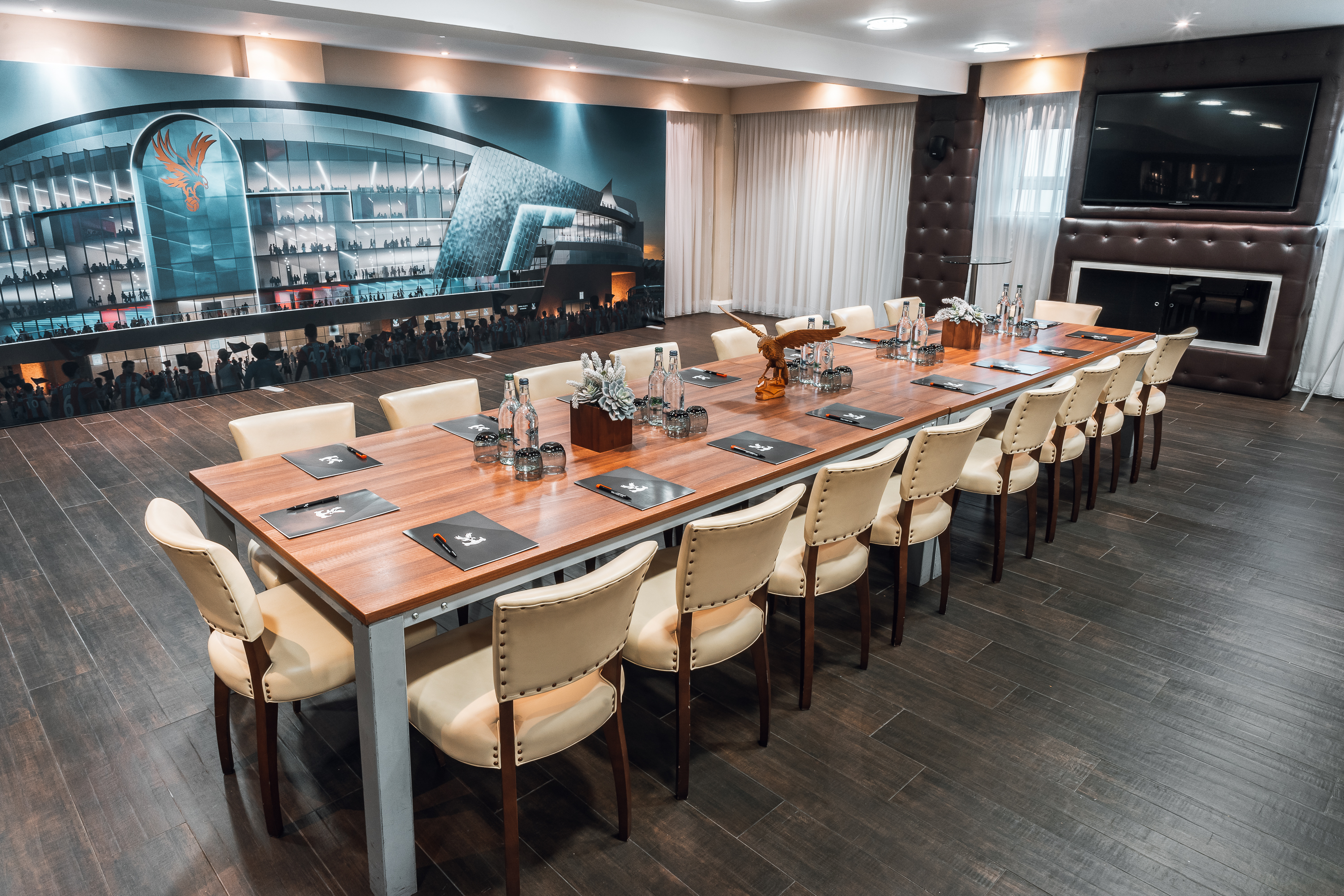 Boardroom at Selhurst Park Stadium with polished table, ideal for corporate meetings.