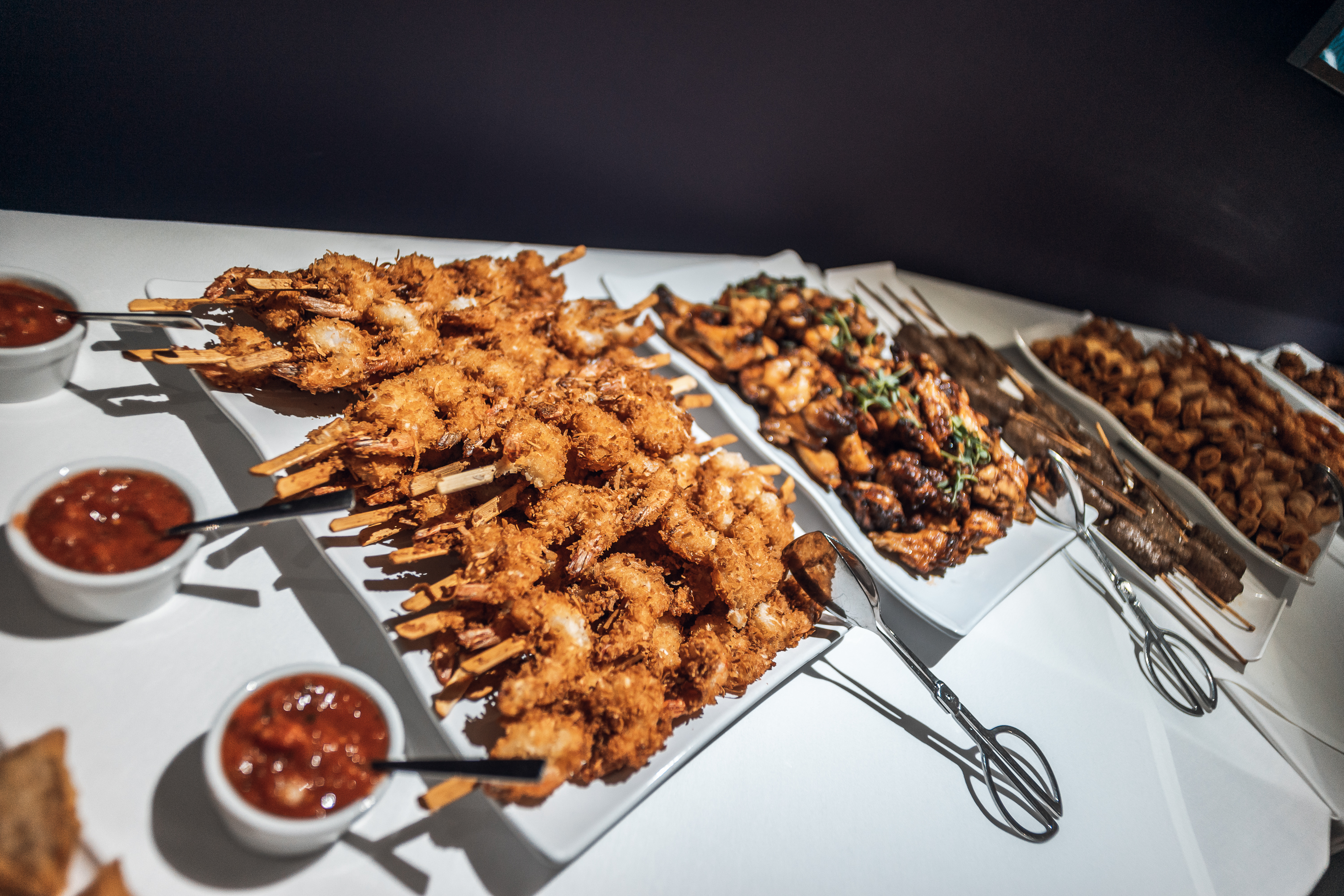 Skewered shrimp and meats at Crystal Palace event, ideal for cocktail parties.