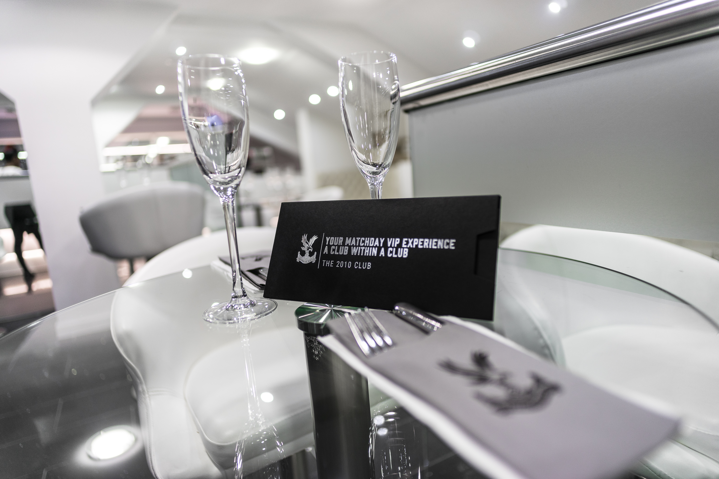 Elegant table setting with glassware at Coppell 2010, Selhurst Park for upscale events.