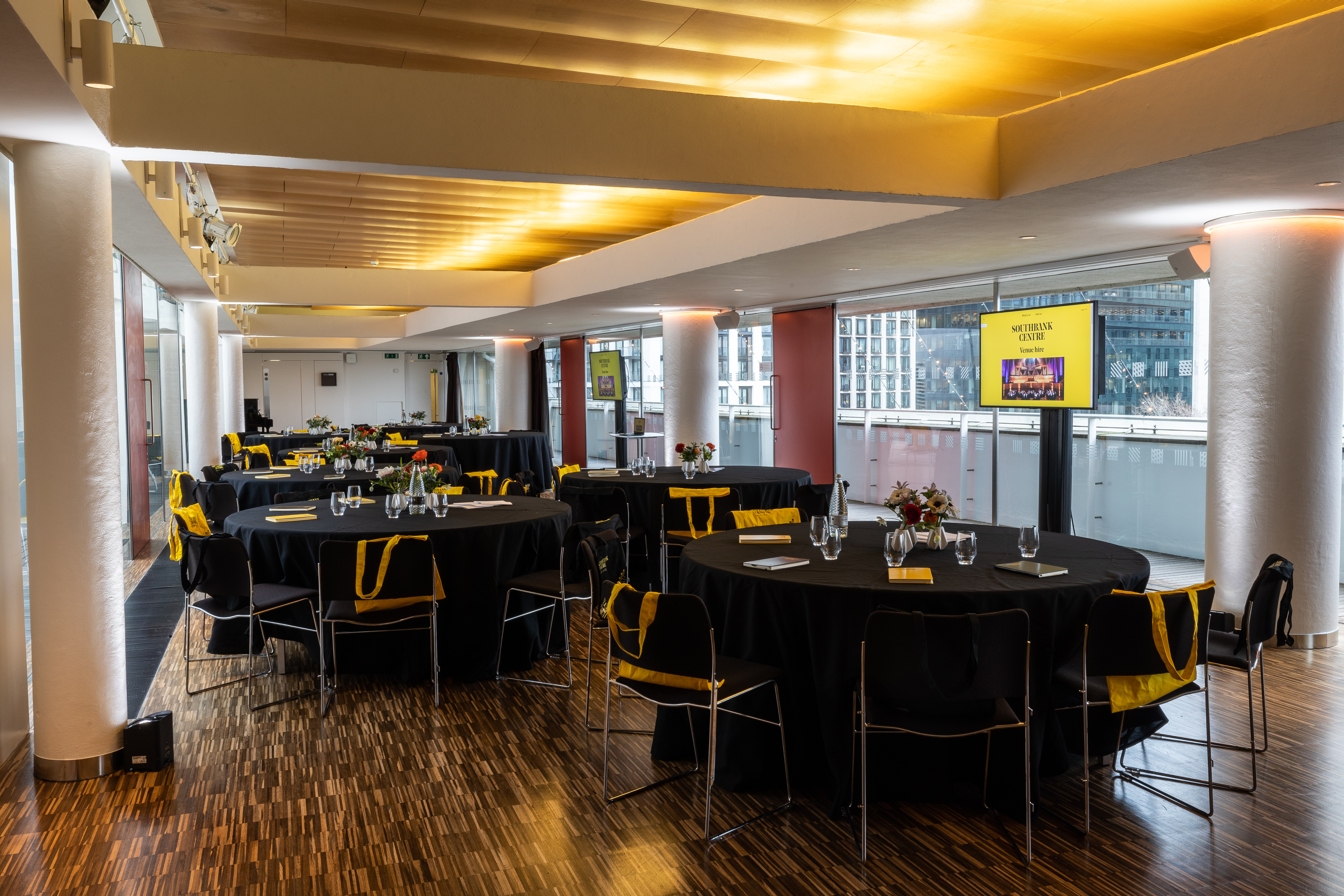 Weston Roof Pavilion event space with round tables, ideal for corporate meetings and gatherings.