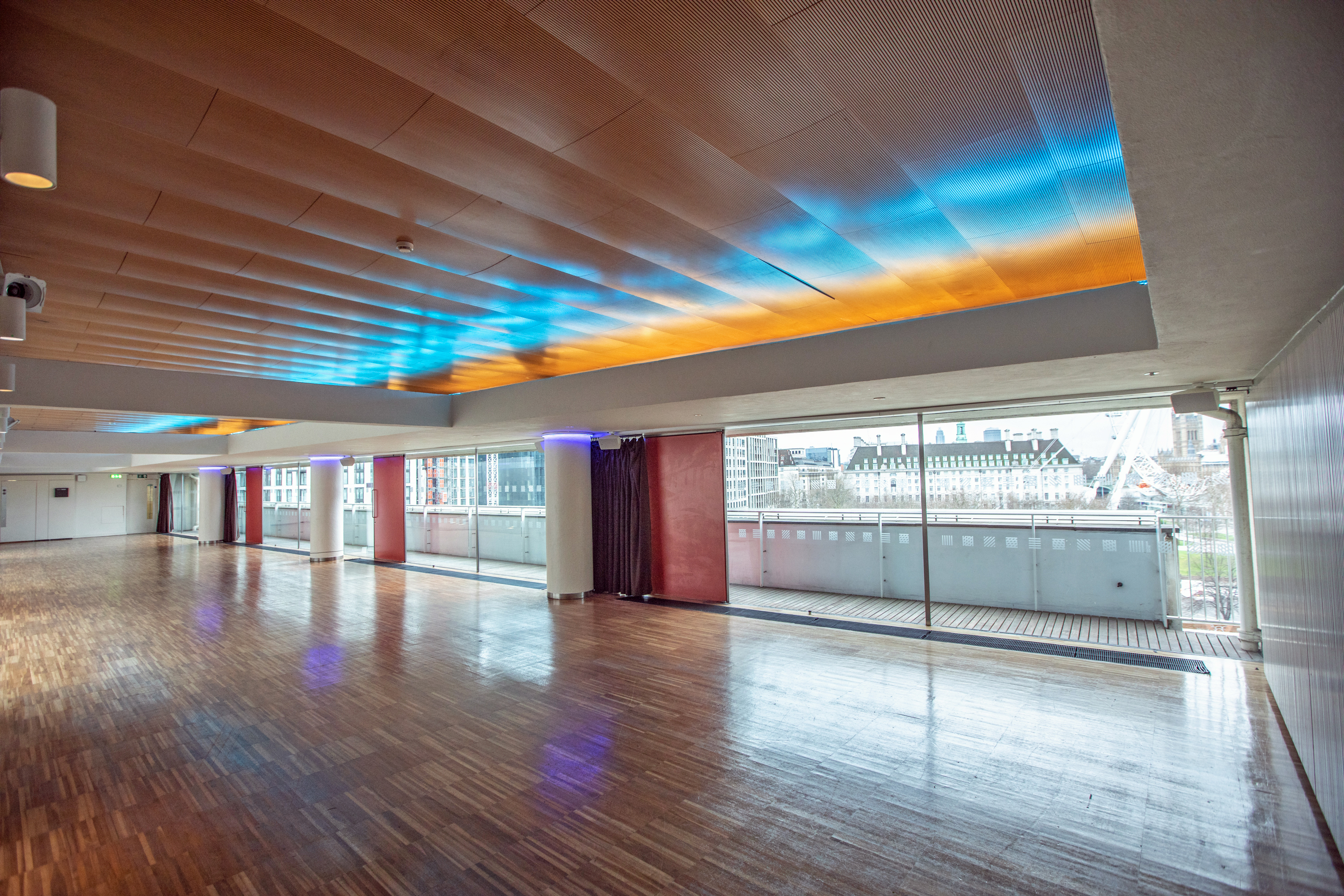 Weston Roof Pavilion, spacious event space with large windows, ideal for meetings and gatherings.