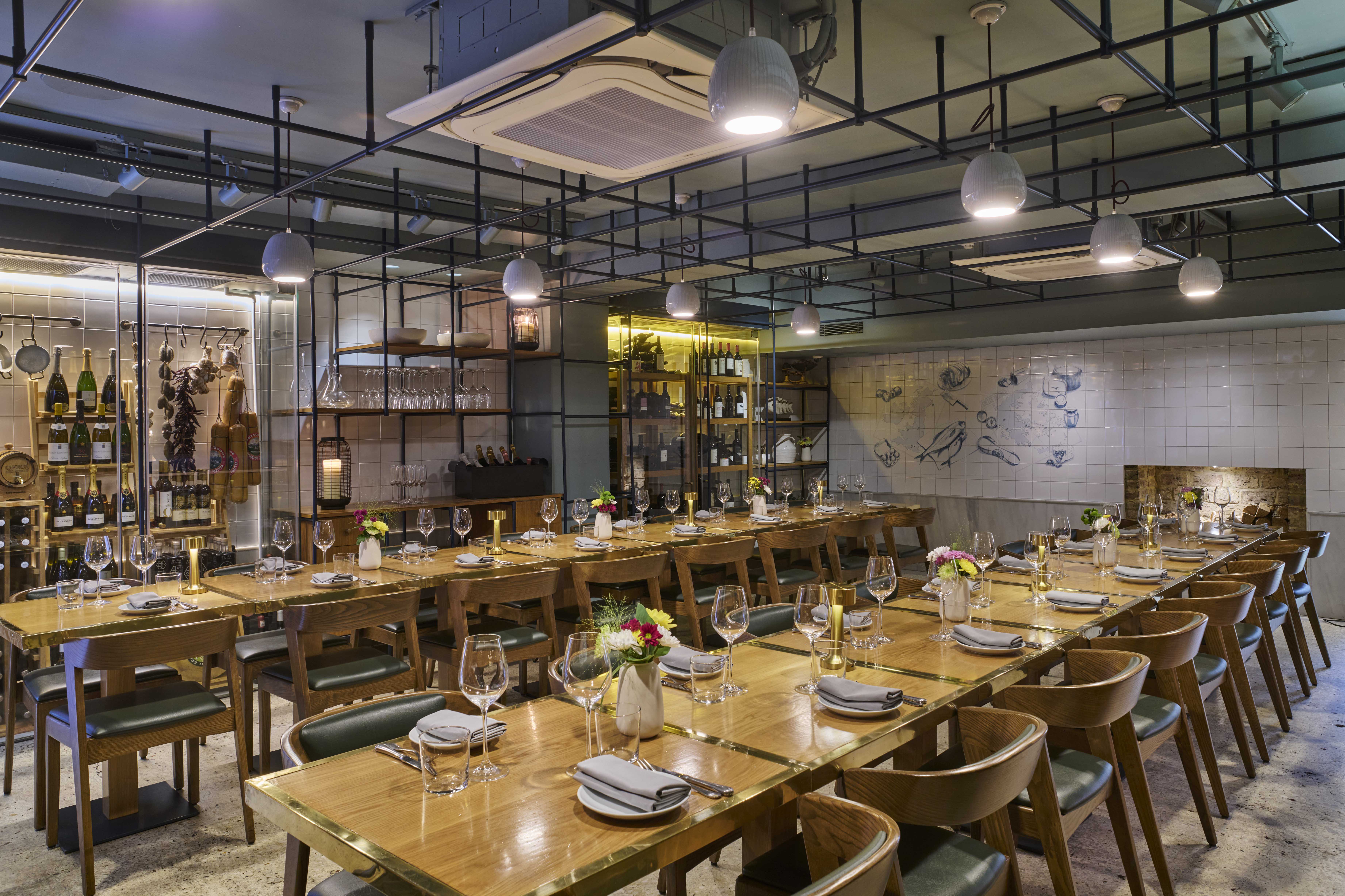 Stylish dining space in The Larder Room, ideal for corporate events and gatherings.