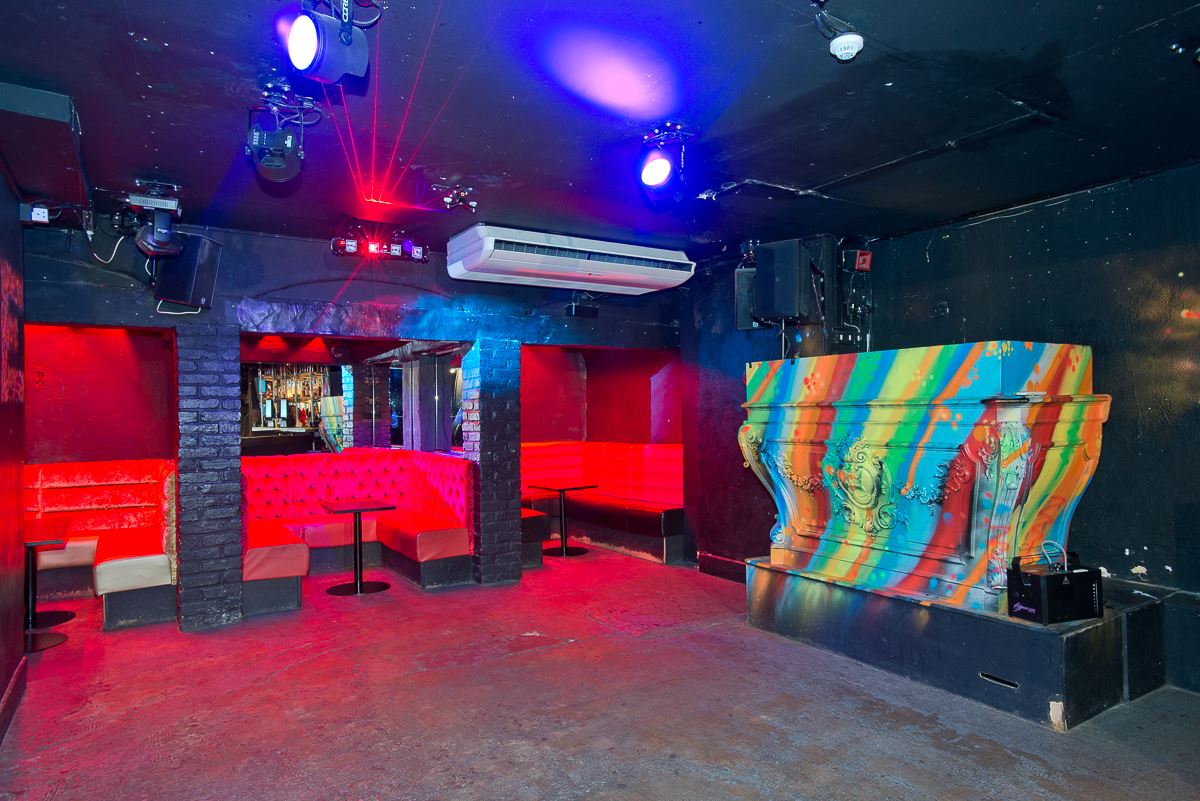 Vibrant event space at The Club in The Village with dynamic lighting, ideal for parties.