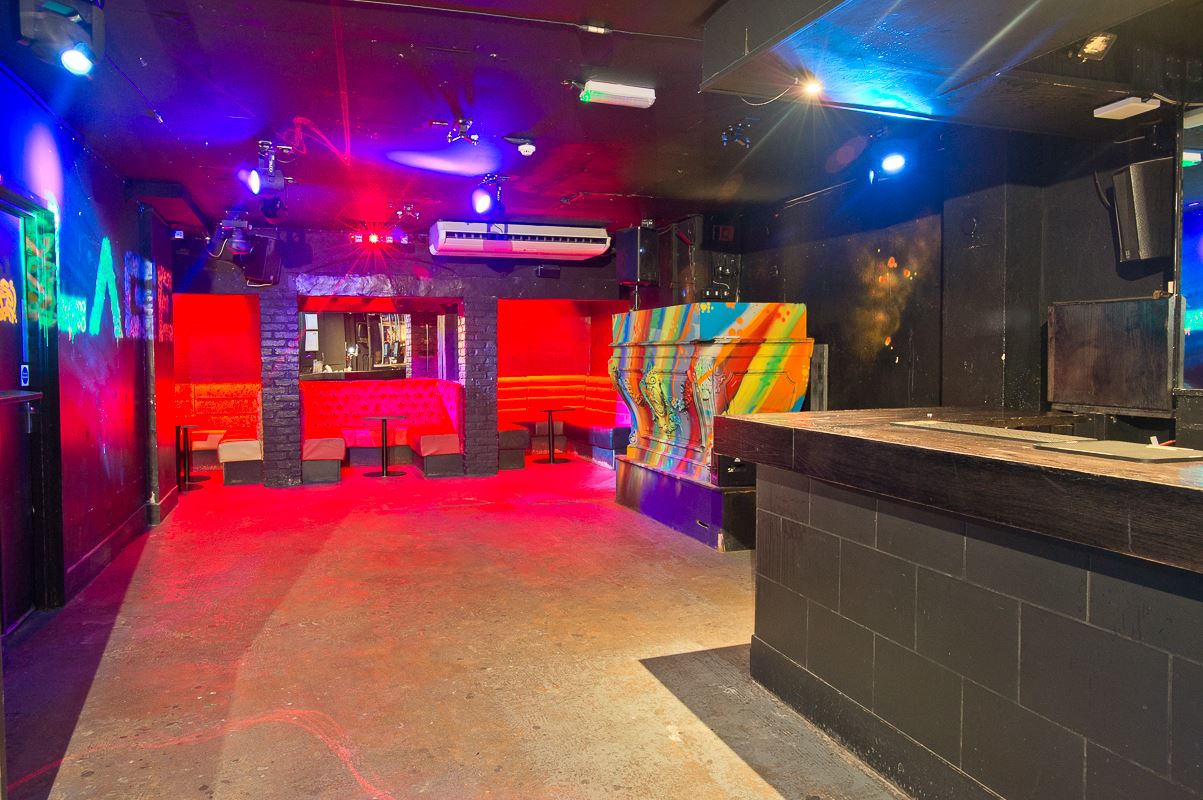 Vibrant multi-colored event space at The Club, perfect for parties and networking events.