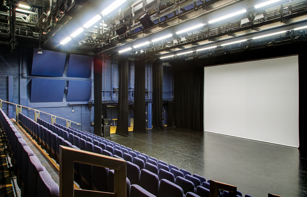 Lilian Baylis Studio stage with tiered seating for conferences and performances.