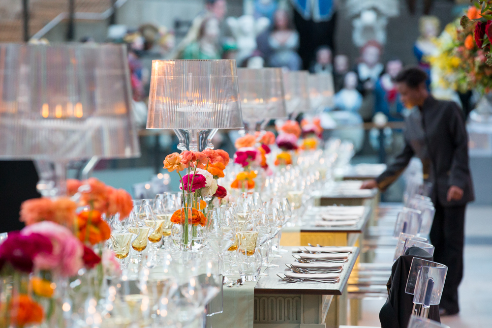 Elegant event space at The Dry Berth, featuring floral centerpieces and warm lighting.