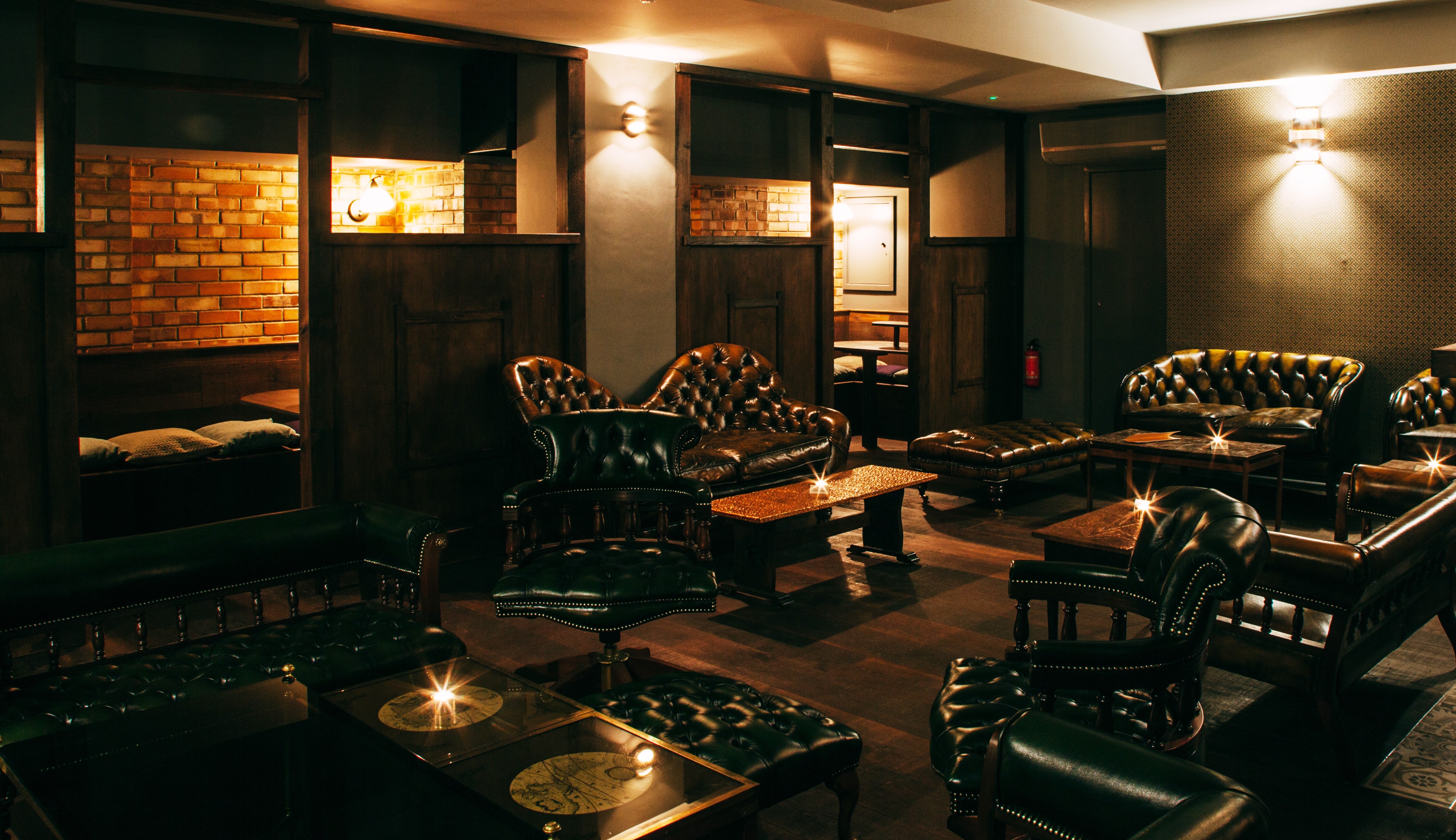 Sophisticated lounge with plush leather seating for exclusive networking events.