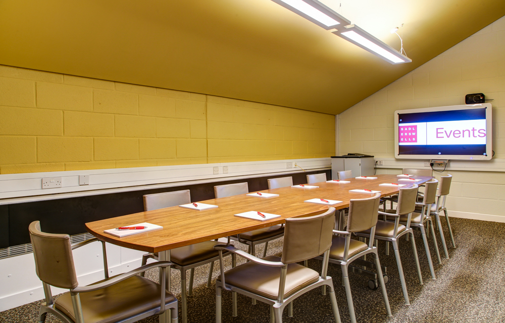 Meeting room at Cripplegate Rooms, Sadler's Wells, with modern tech and inviting decor.