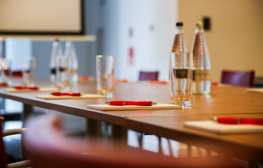 Pina Bausch Room at Sadler's Wells, polished table set for professional meetings and events.