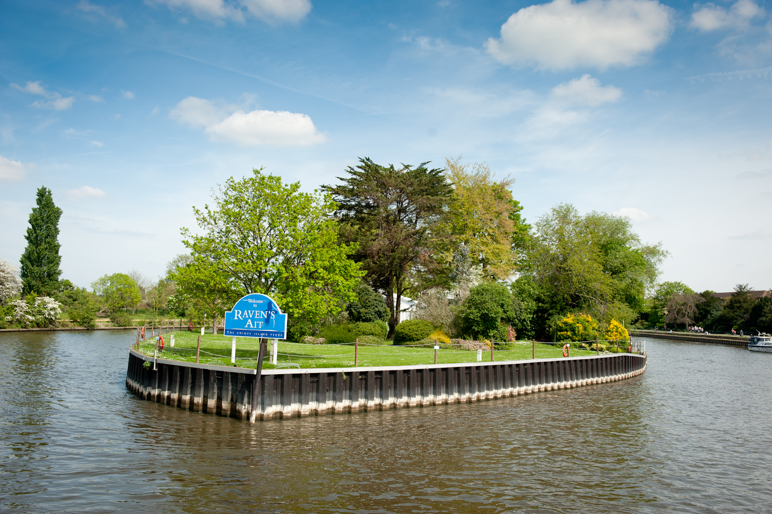 Riverside venue on Ravens Ait Island, ideal for outdoor events and gatherings.