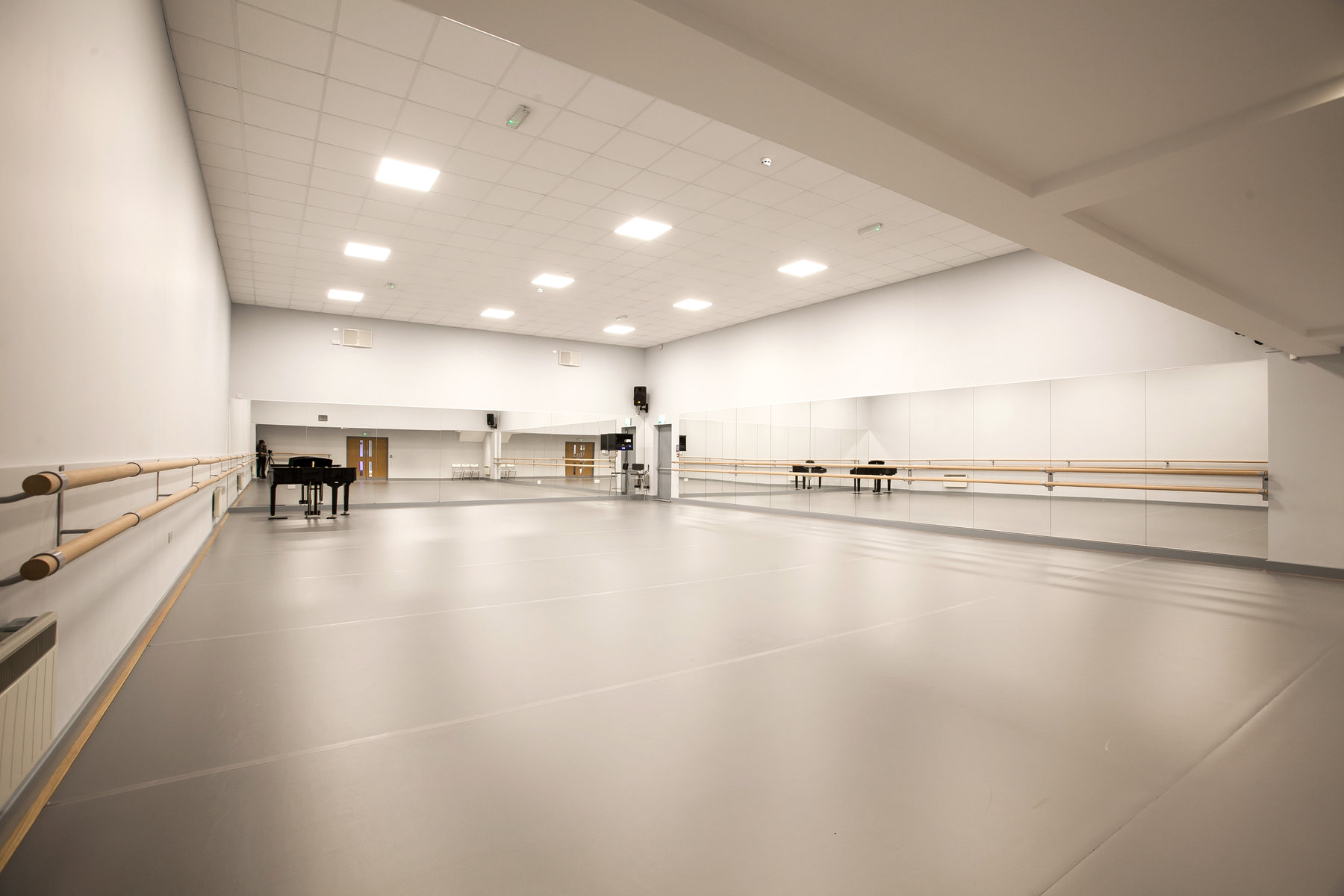 Spacious dance studio with mirrors, ideal for classes and workshops at Adagio School of Dance.
