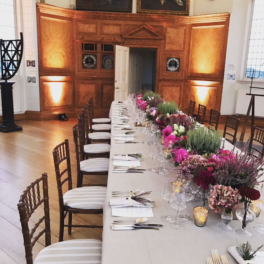 Elegant dining setup with floral centerpieces at The Octagon Room, Royal Observatory event.