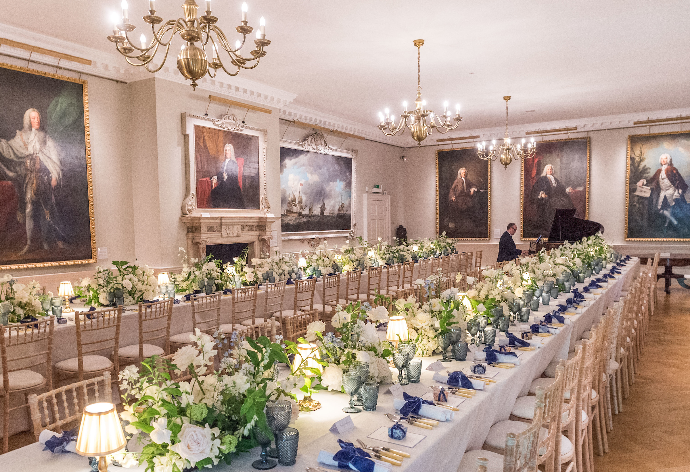 Elegant banquet hall with floral centerpieces for formal events at The Foundling Museum.