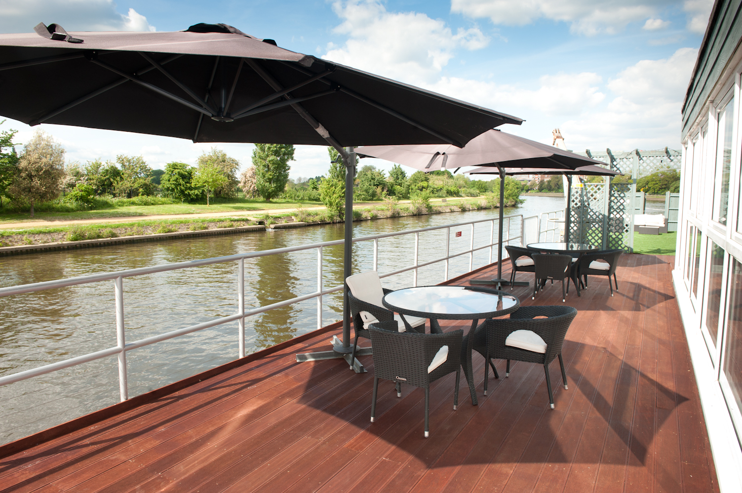 Outdoor meeting space at The Britannia Suite, Ravens Ait Island, ideal for networking events.