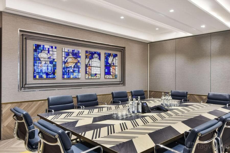 Executive boardroom with leather seating for high-stakes business meetings and corporate events.