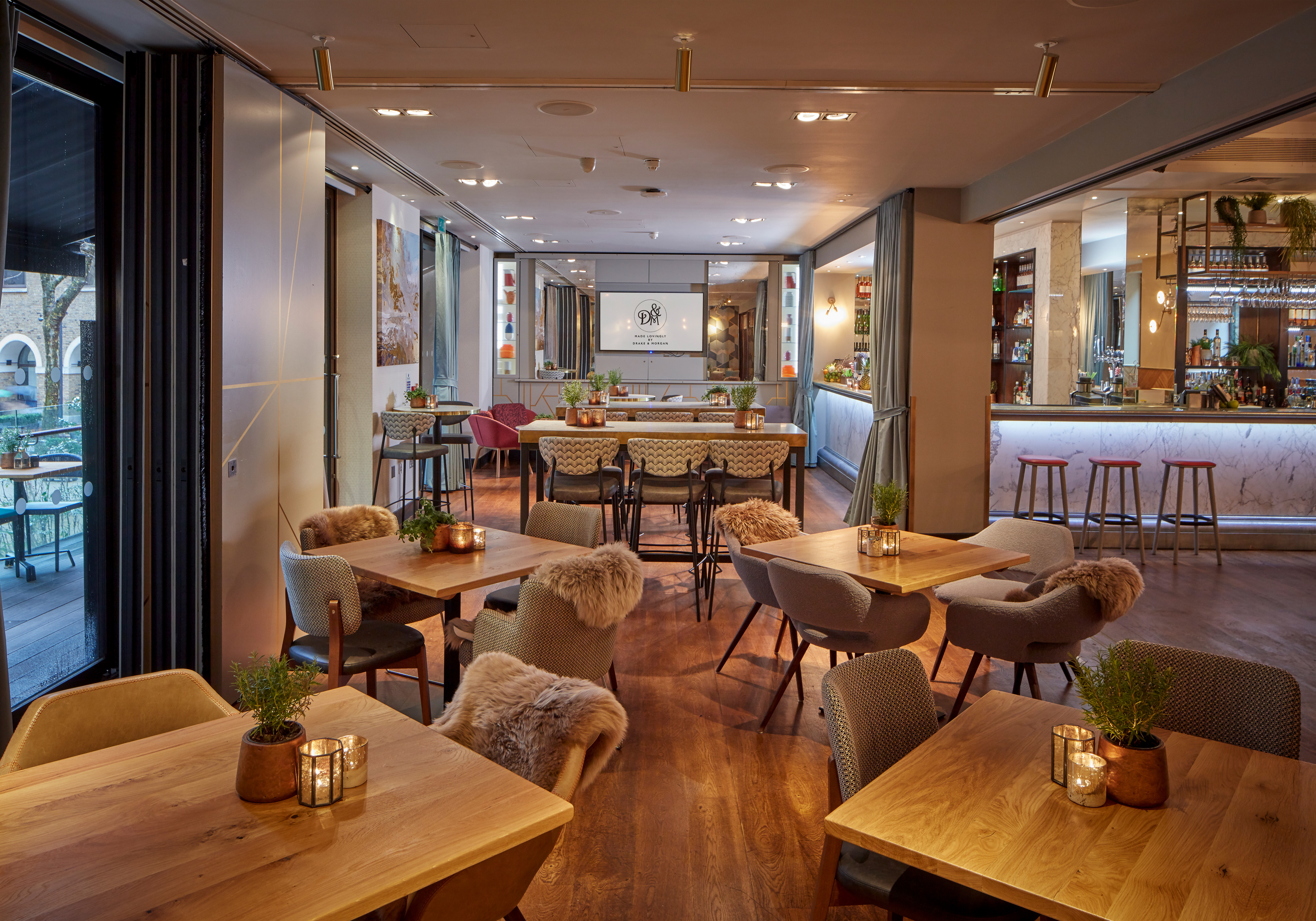 Stylish event space with warm lighting for intimate gatherings and networking in Devonshire Terrace.