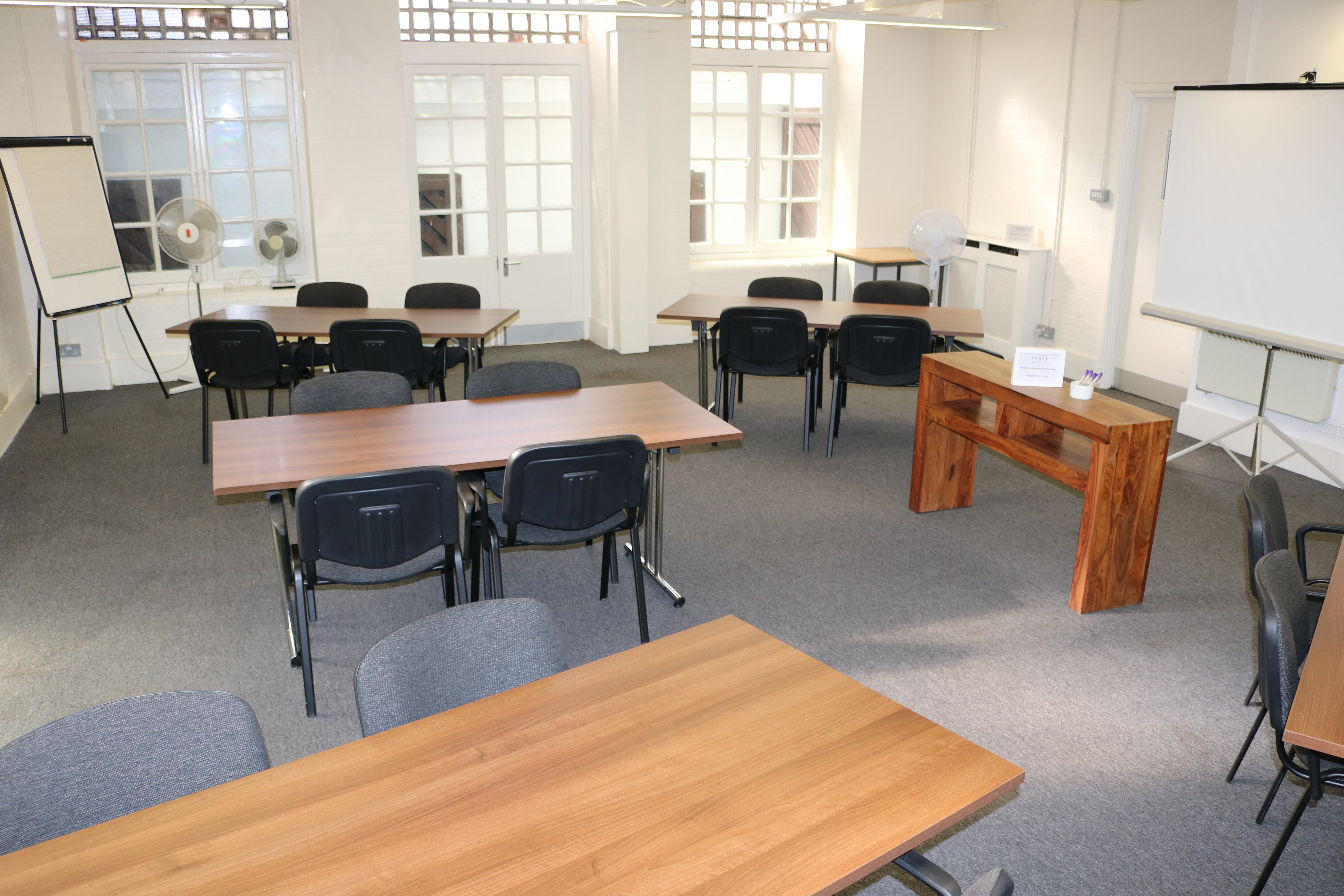 Portman Lounge in SPACE: versatile meeting space with natural light for workshops and training.