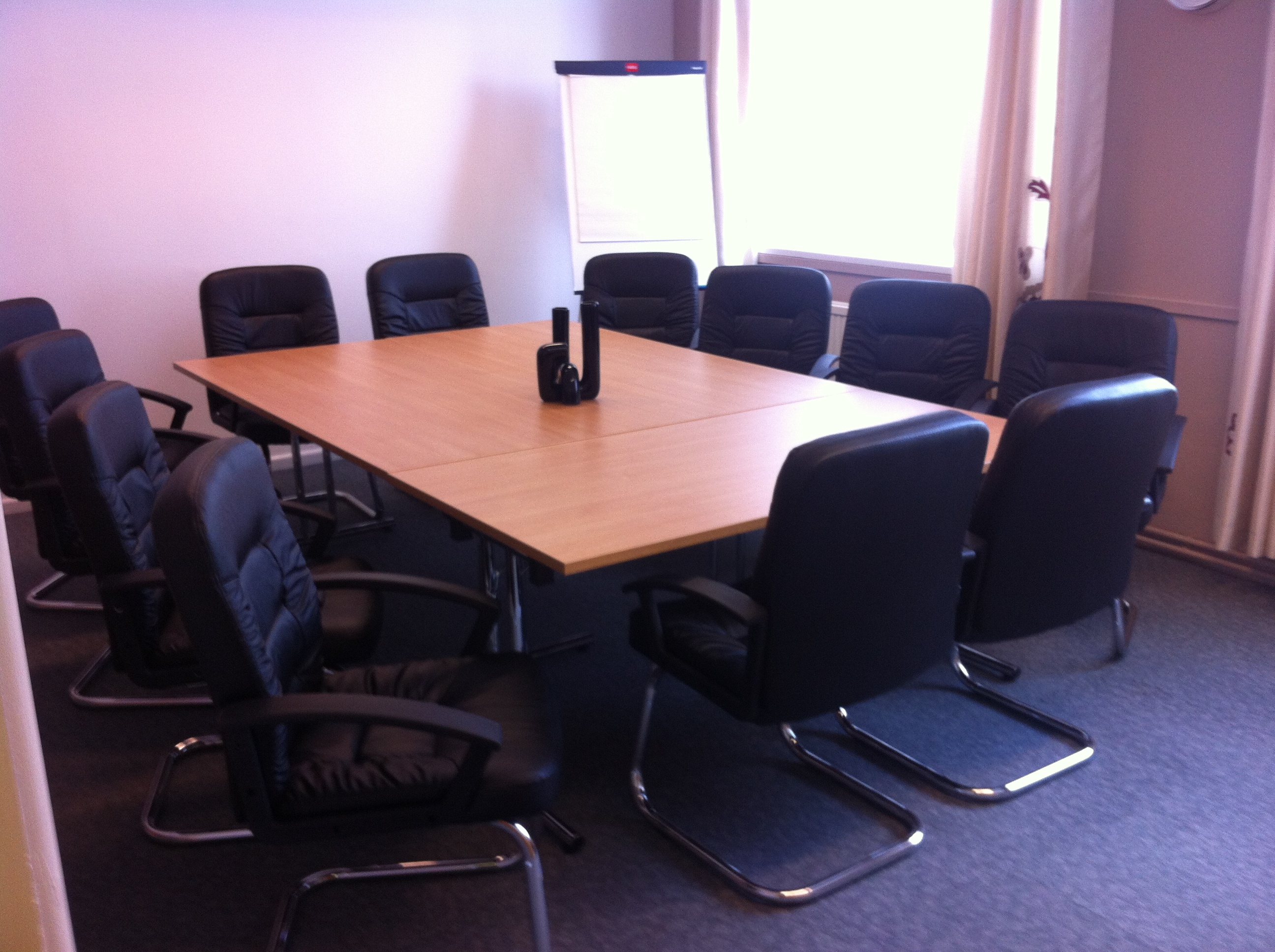 Briton Room in Ayton House: bright meeting space with ergonomic chairs for collaboration.