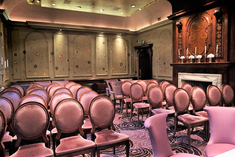 Elegant meeting room with plush seating at The Roseate, Reading for intimate gatherings.