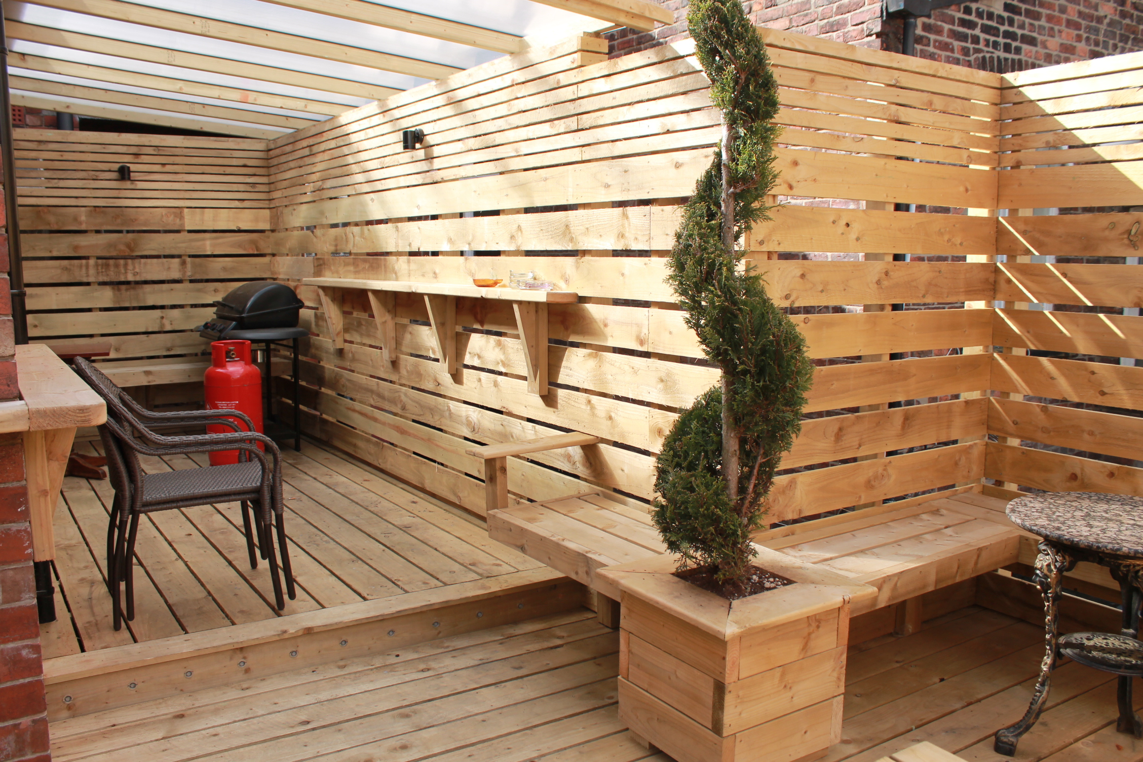 Versatile outdoor venue with wooden structure for intimate gatherings and networking events.