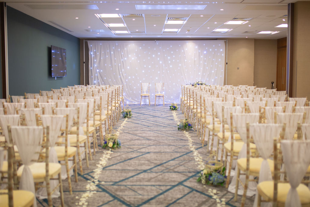 Frogmore Suite at Crowne Plaza Reading East, elegant wedding event space with floral accents.