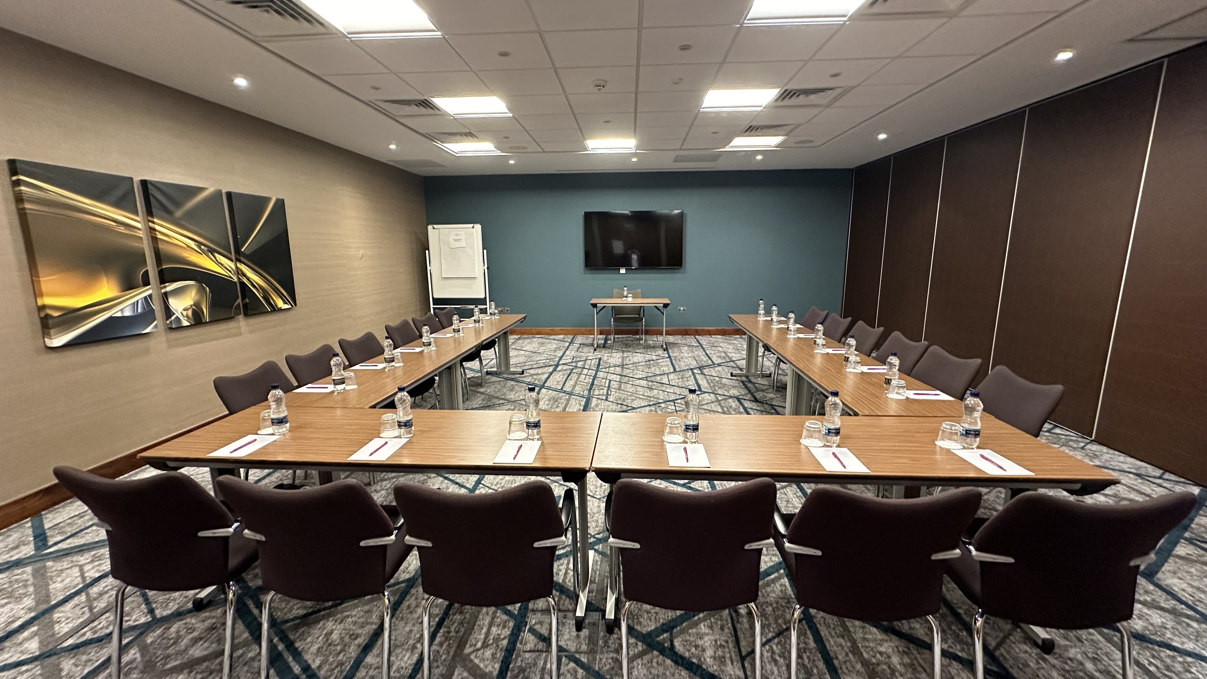 Meeting room at Crowne Plaza Reading East with U-shape layout for workshops and presentations.