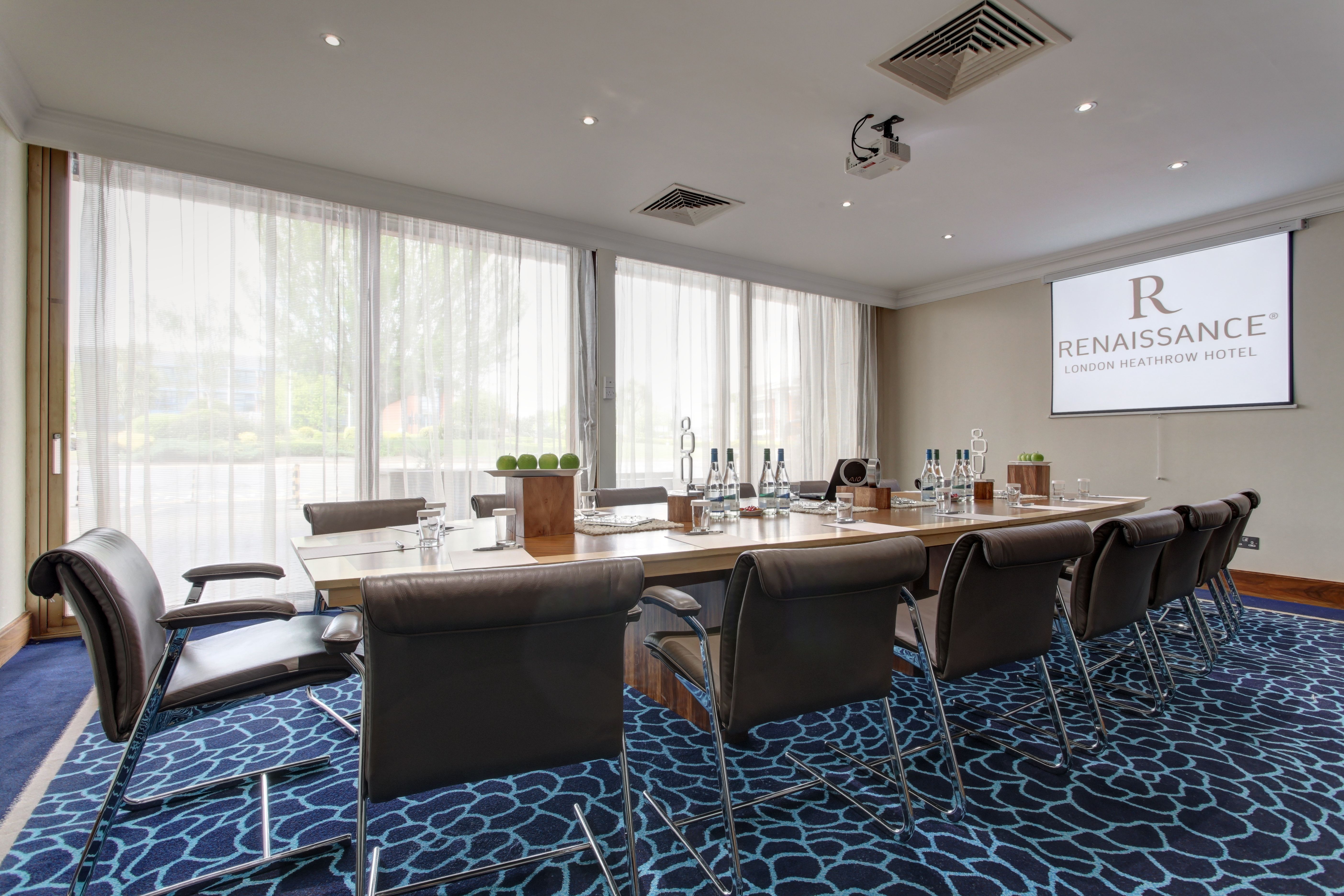 Reading Room at Renaissance London Heathrow Hotel, spacious meeting room for corporate events.