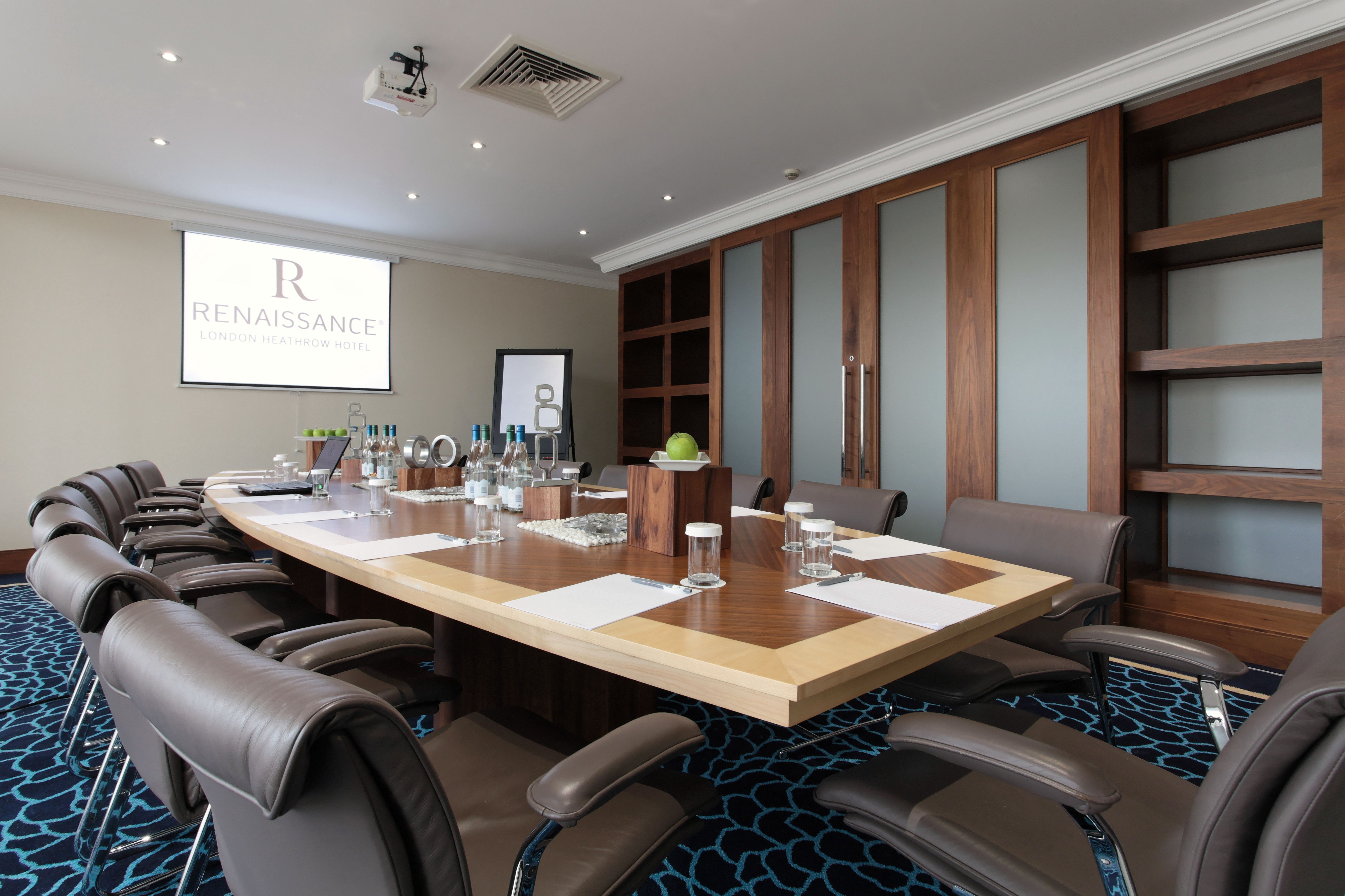 Reading Room at Renaissance London Heathrow Hotel, modern meeting space for professional events.