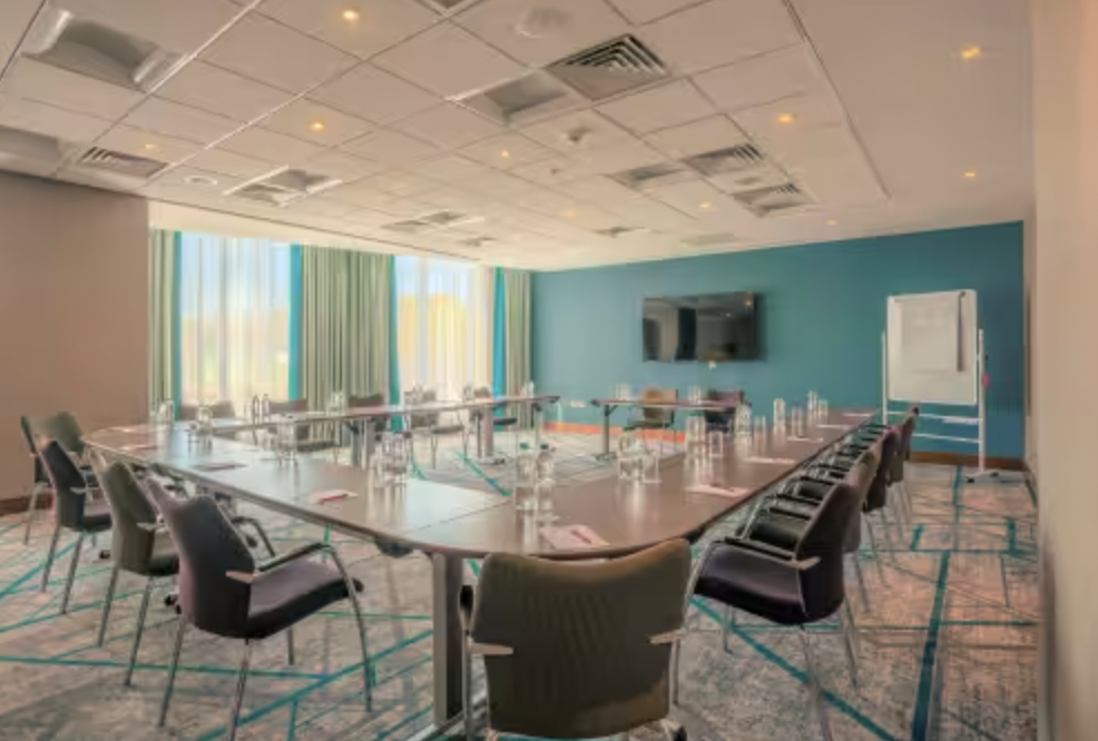 Meeting room at Crowne Plaza Reading East with natural light, ideal for workshops and meetings.