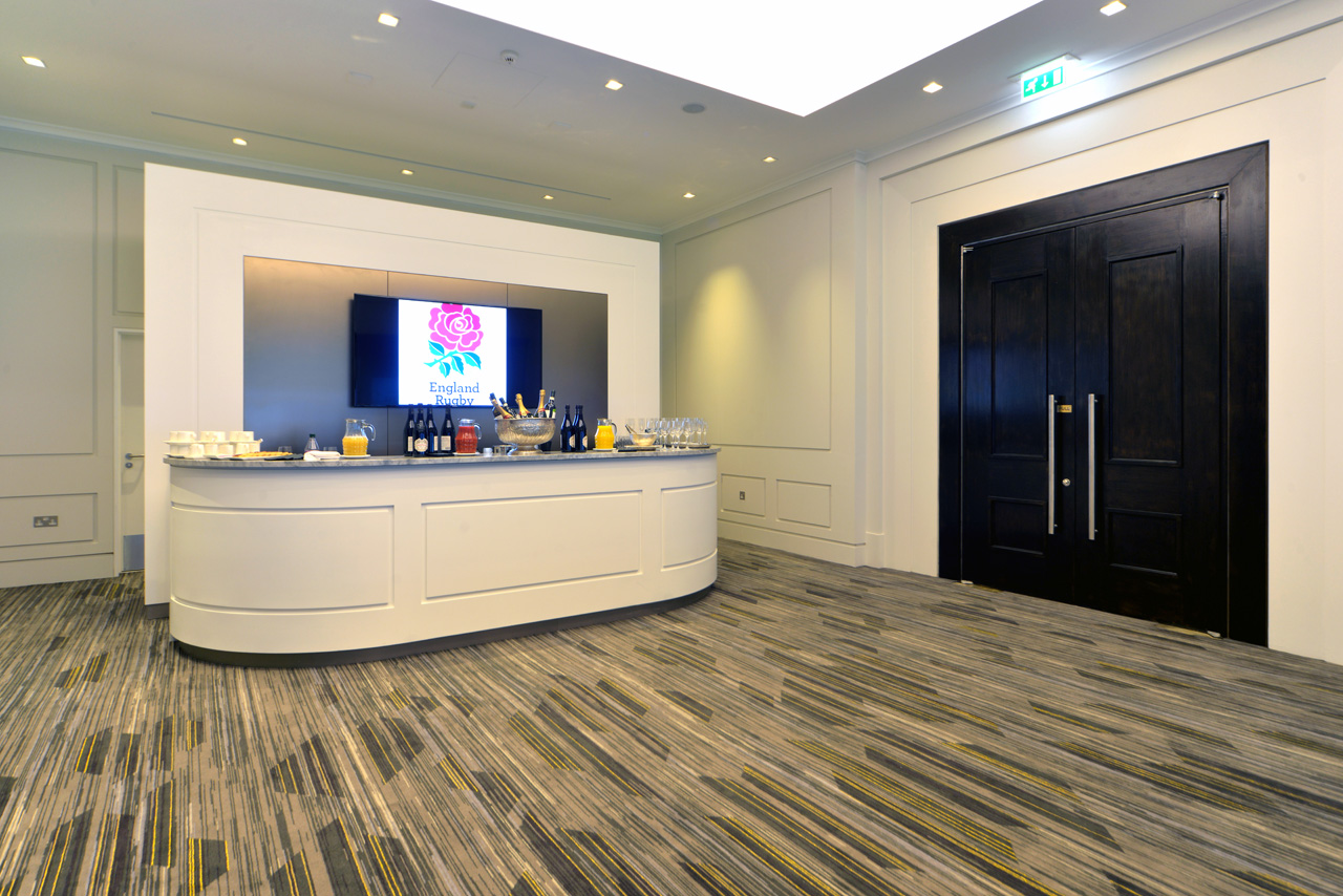 Presidents' Suite at Allianz Stadium: modern event space with stylish refreshment station.