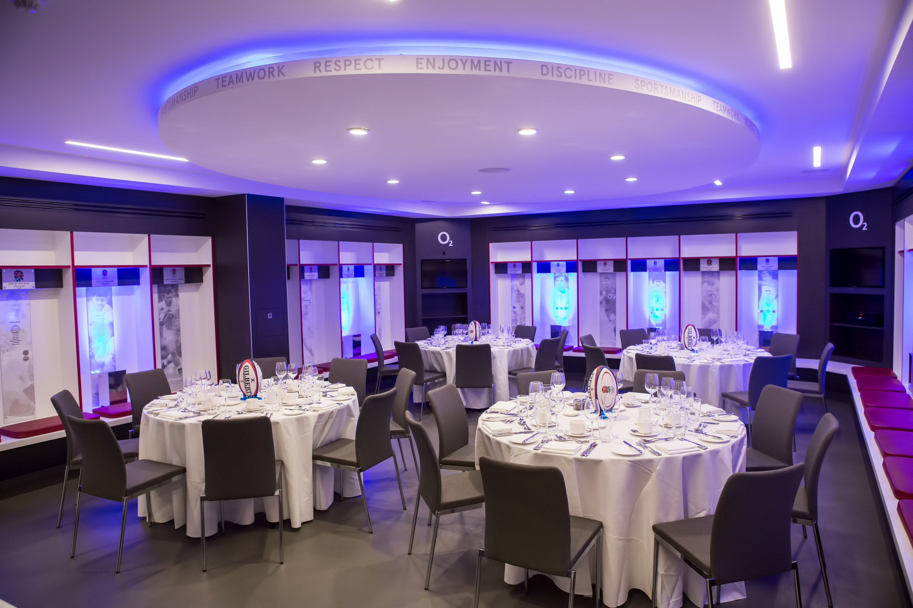 England Changing Room at Allianz Stadium, Twickenham, set for a formal dinner event.