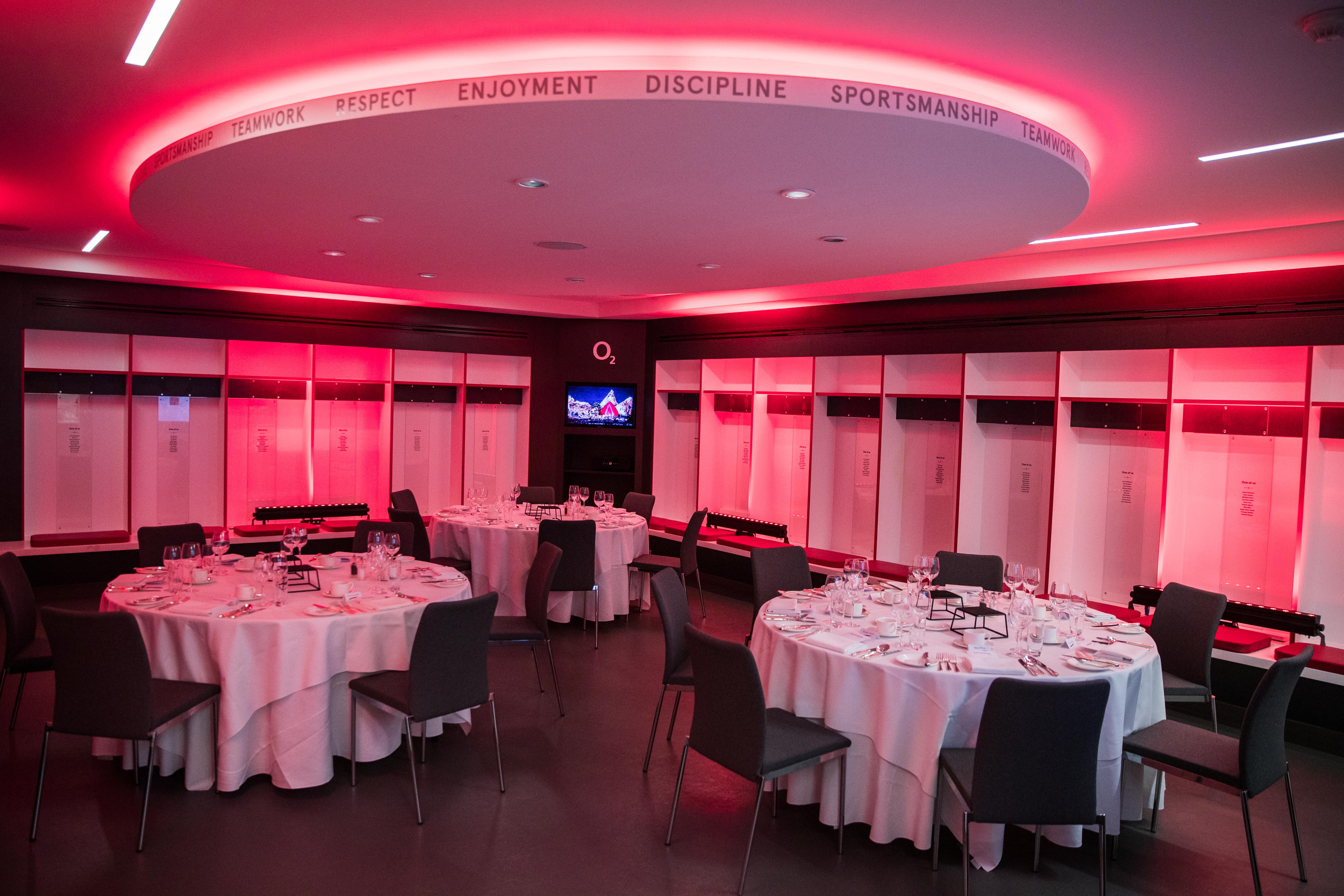 "Allianz Stadium England Changing Room with elegant dining setup for corporate events."
