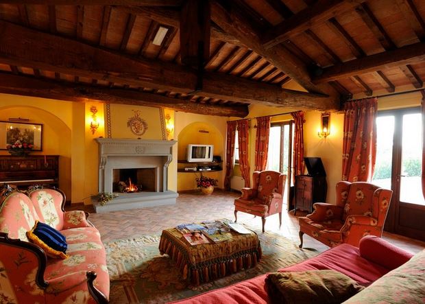 Cozy meeting space with rustic beams at Villa of the Angels, ideal for retreats and gatherings.