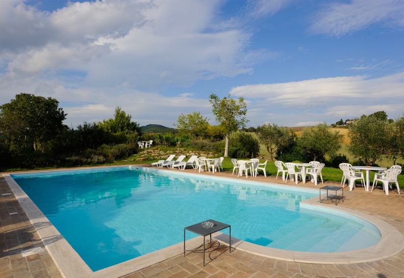 Serene outdoor pool at Villa of the Angels, ideal for networking events in Tuscany.