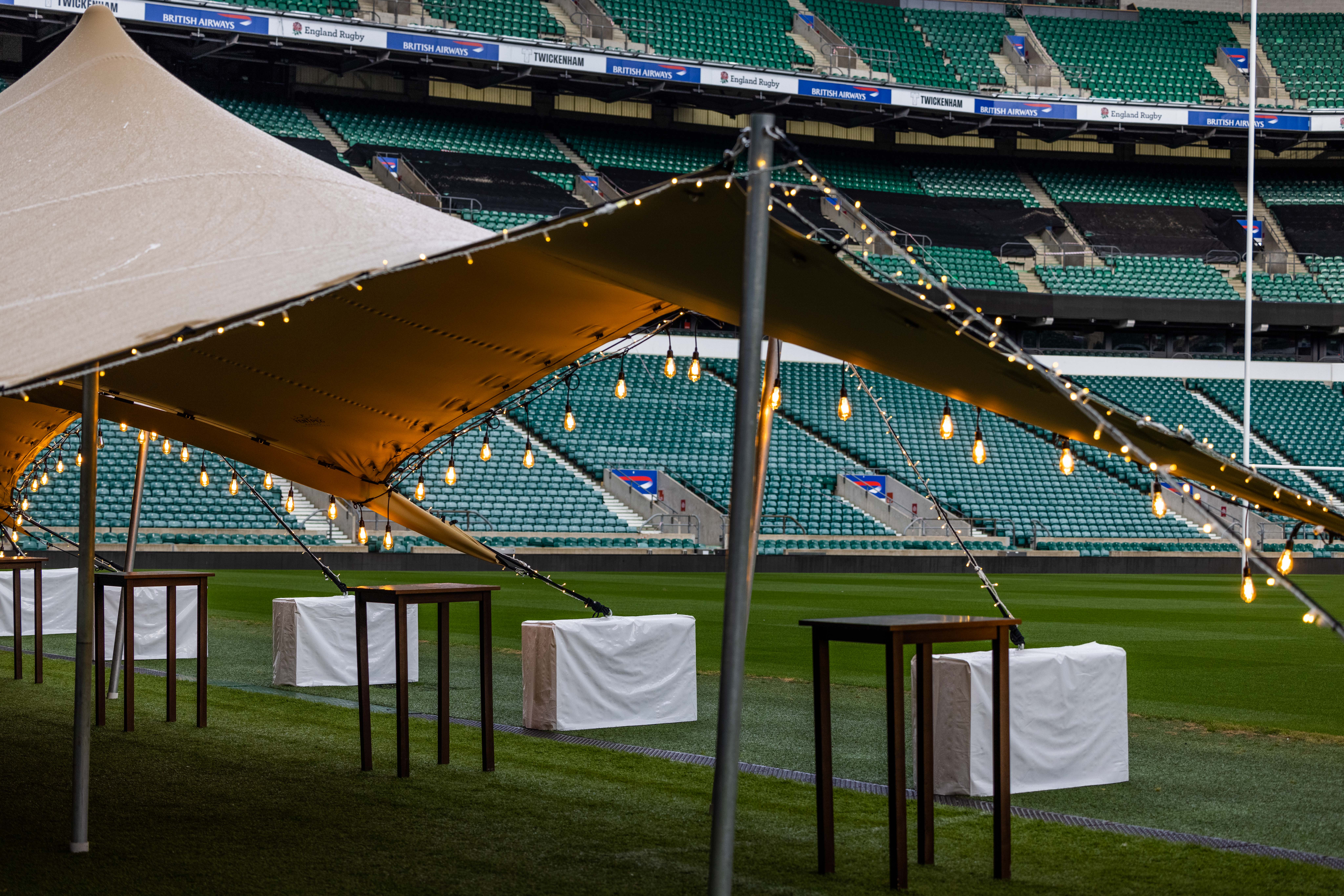 Allianz Stadium event space with elegant tent and lush green pitch, perfect for gatherings.