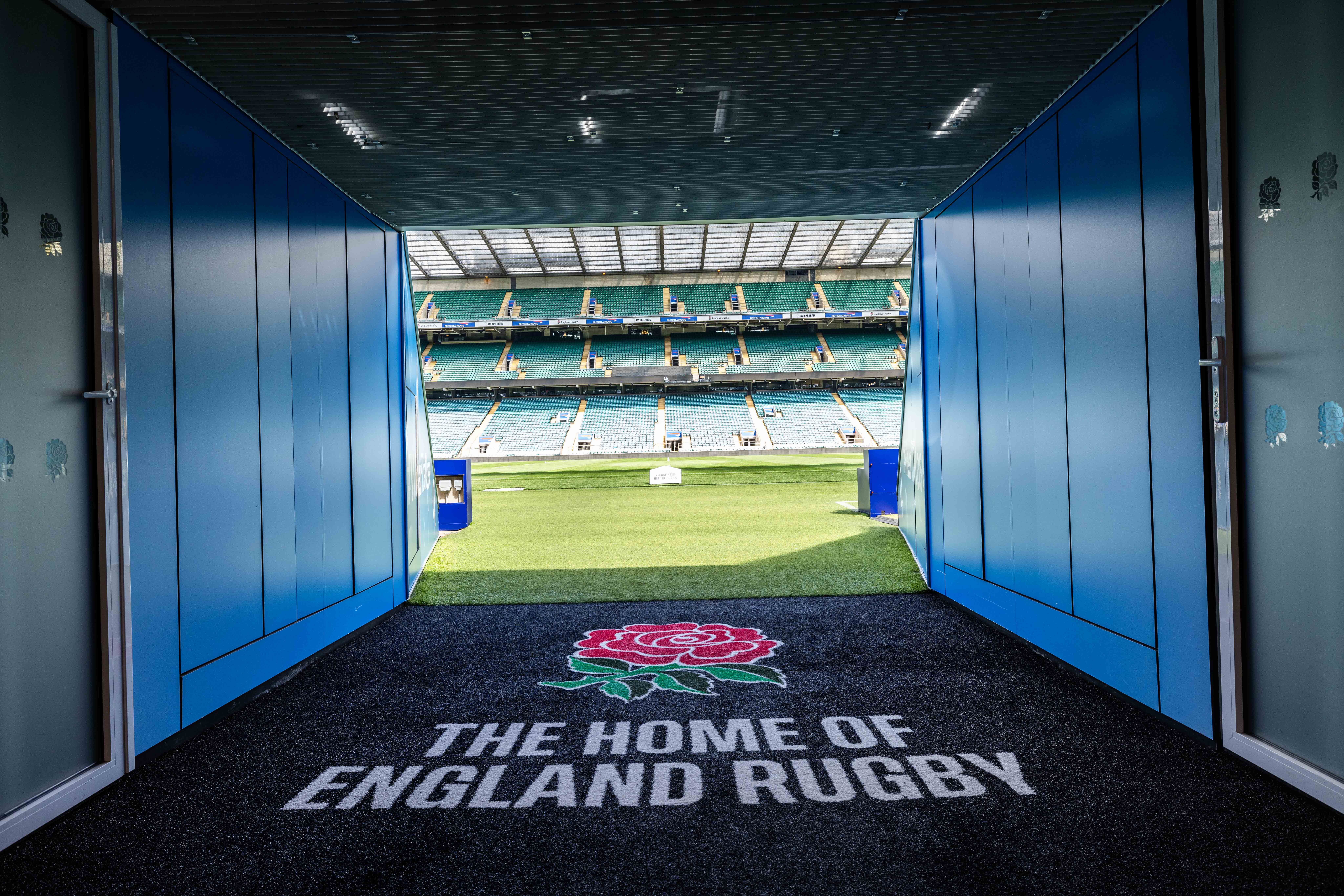 Allianz Stadium Players' Tunnel with expansive rugby pitch, ideal for corporate events.