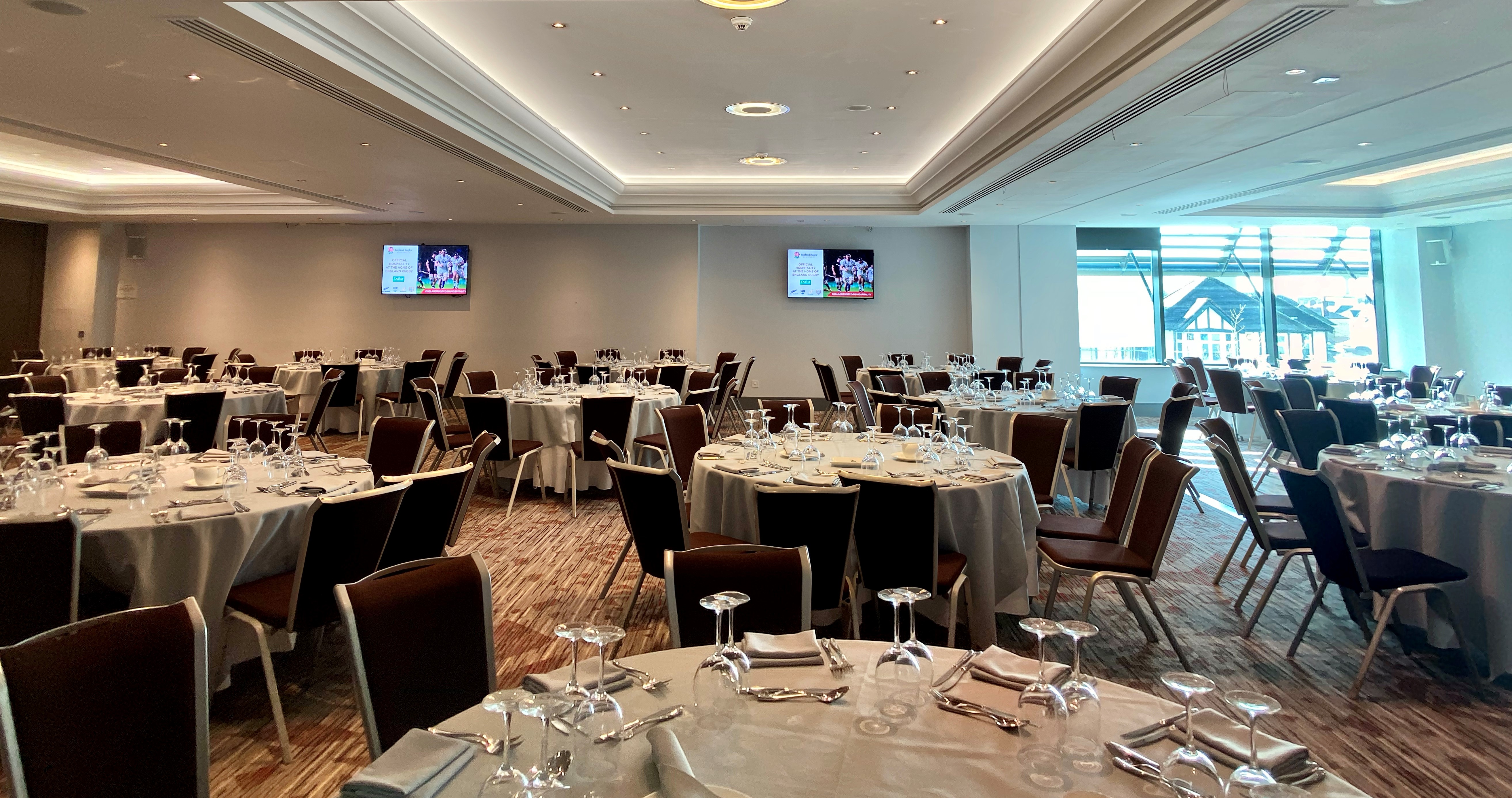 Elgar Suite at Allianz Stadium, Twickenham: elegant dining setup for corporate events.