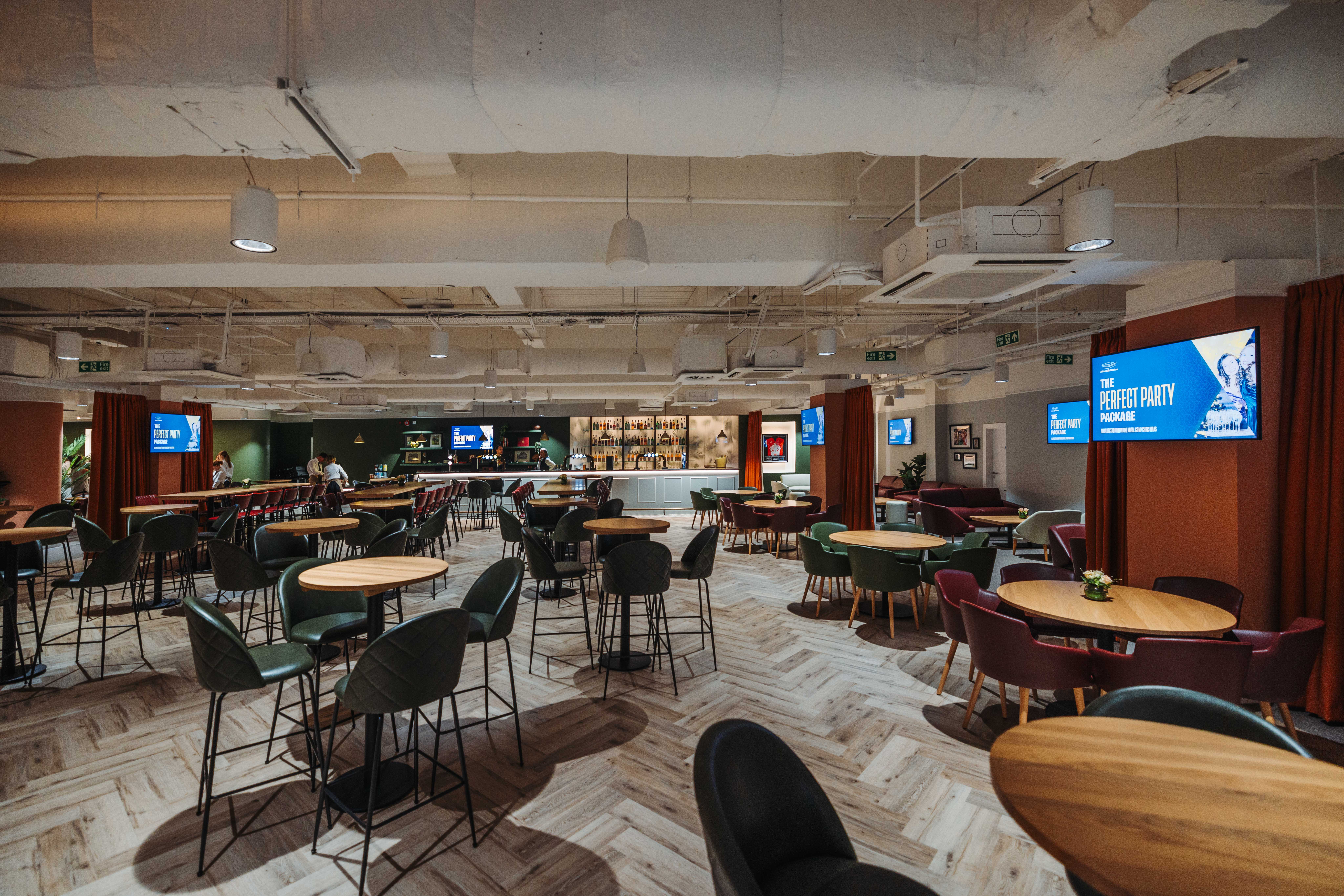 Allianz Suite at Twickenham Stadium, modern event space with stylish furnishings.