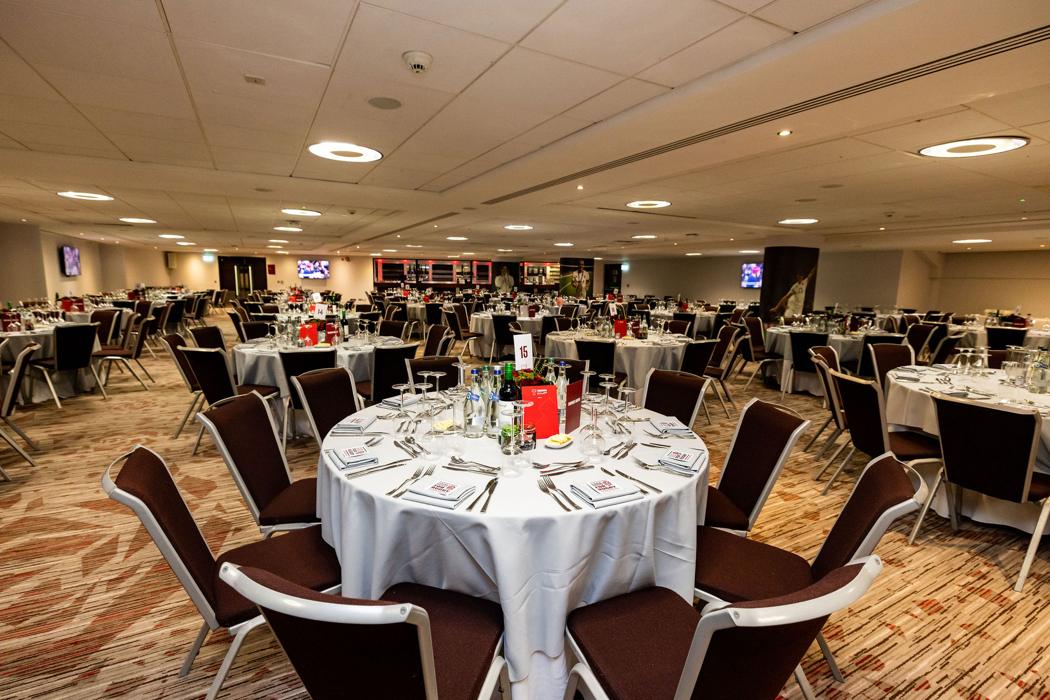 Nightingale Suite at Allianz Stadium, Twickenham: elegant dining setup for corporate events.