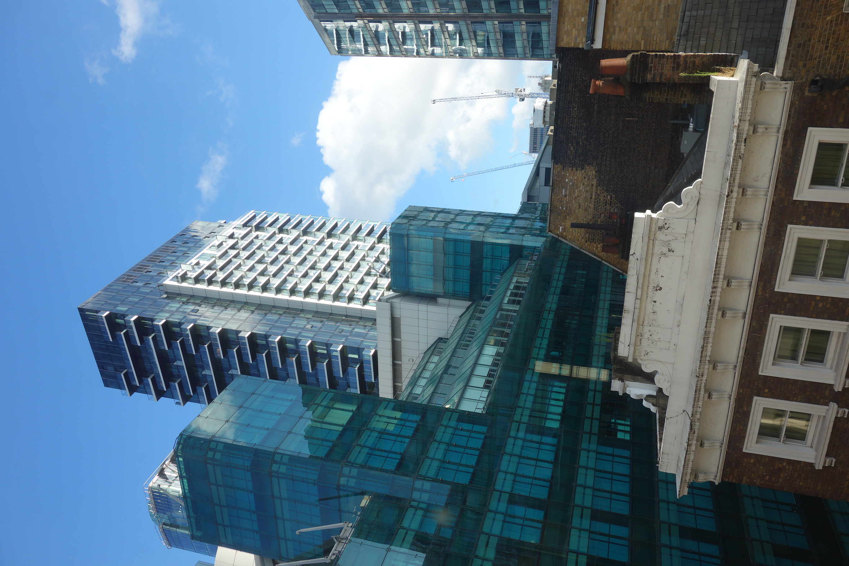 Modern London rehearsal space with sleek glass buildings, ideal for corporate events.