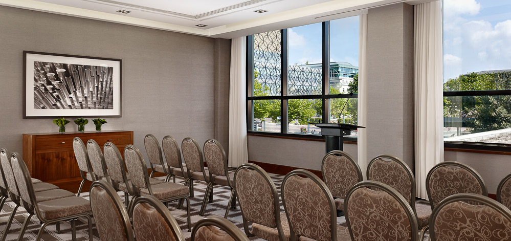 Meeting room at Hyatt Regency Birmingham with natural light, ideal for corporate events.