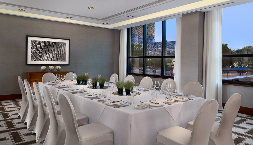 Elegant dining setup in Hyatt Regency Birmingham for corporate events.