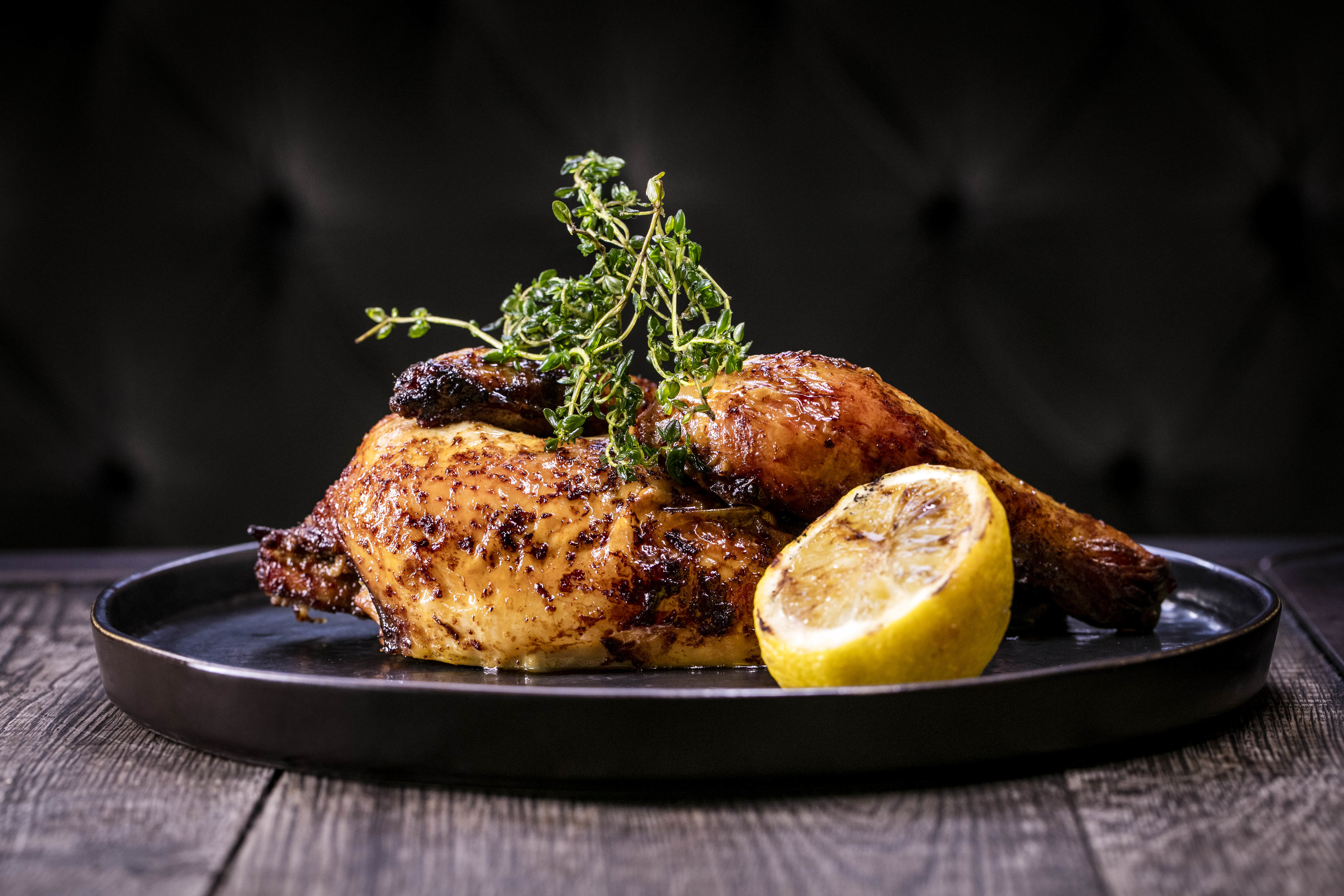 Roasted chicken dish at Main Bar & Lounge, St Bart's - event catering and dining experience.