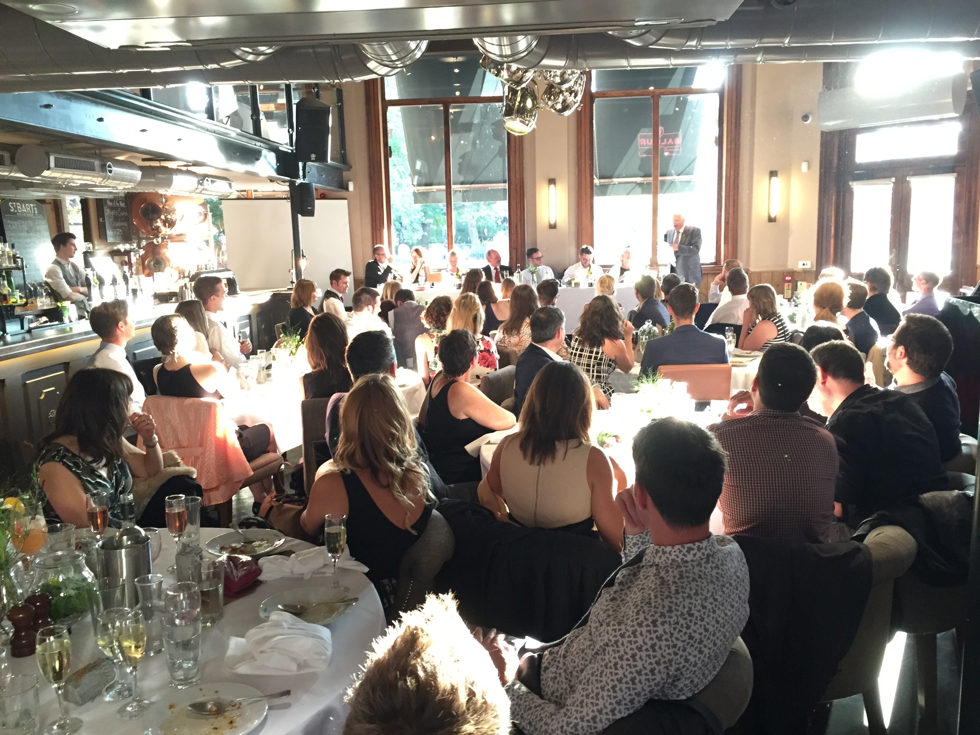 Stylish Balfour St Bart's venue hosting a networking event with engaged guests.