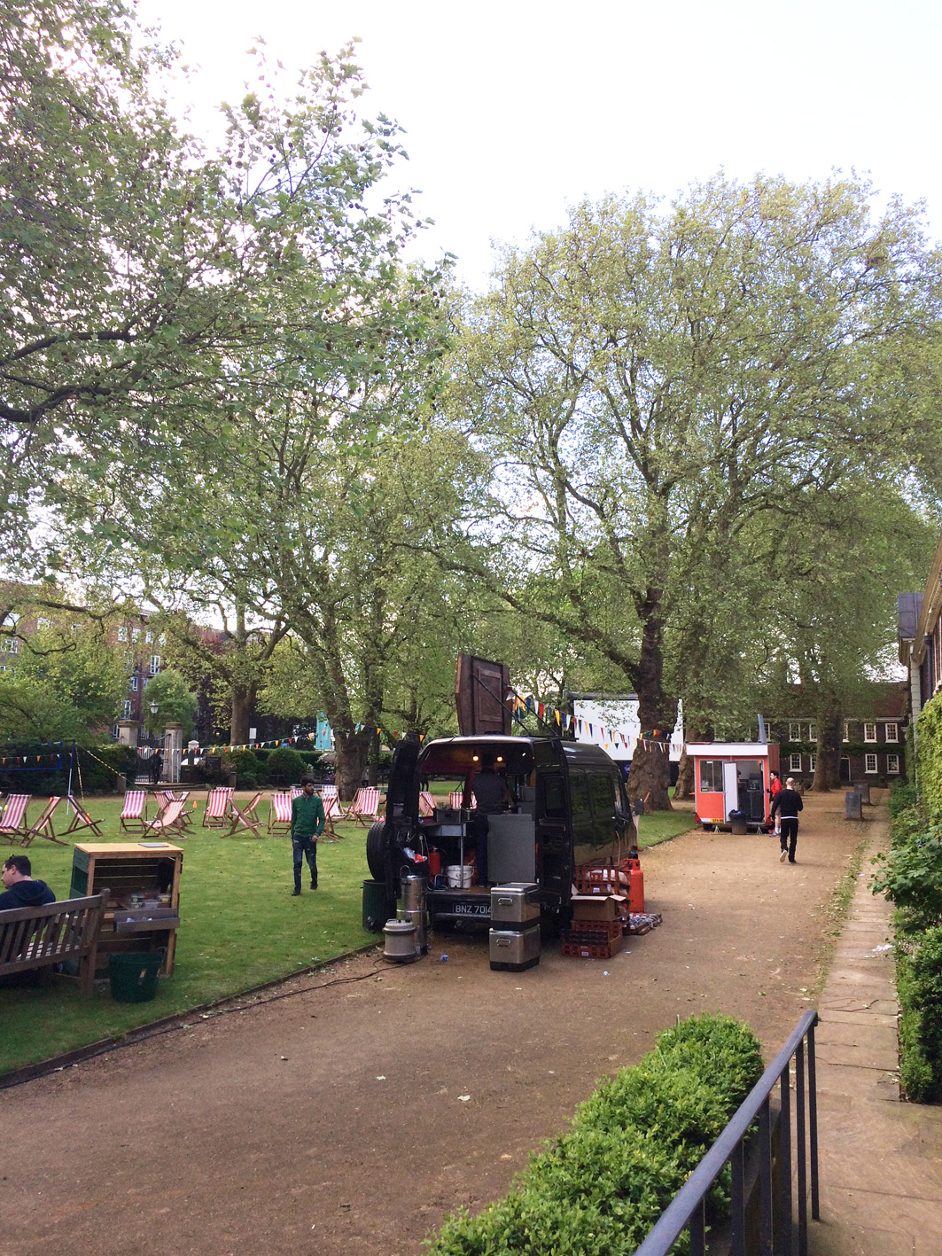 Vibrant outdoor event space at The Museum of the Home with lush greenery and food truck.
