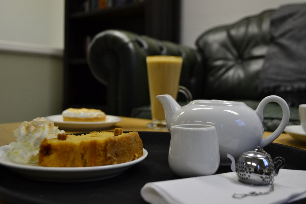 Cozy Chill Out Zone with teapot and pastries for networking events at Flavours & Fables.