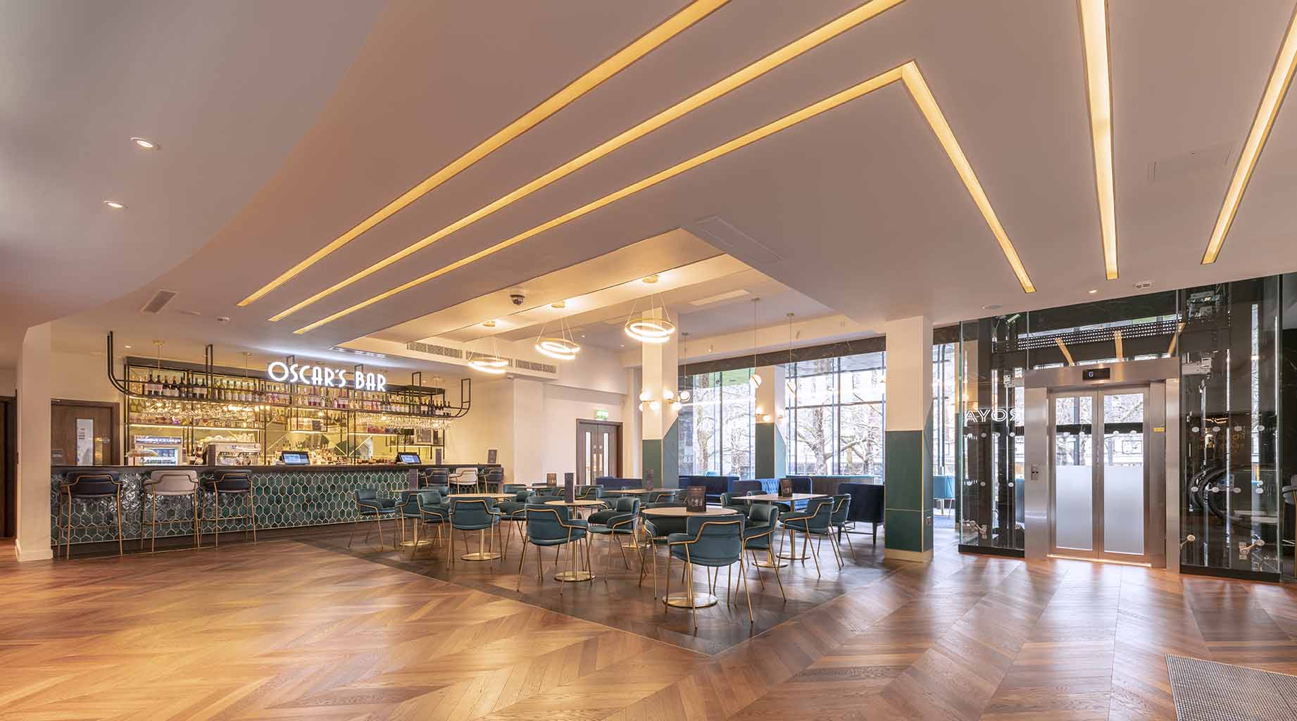 Modern bar area in ODEON LUXE Leicester Square, ideal for networking events and gatherings.