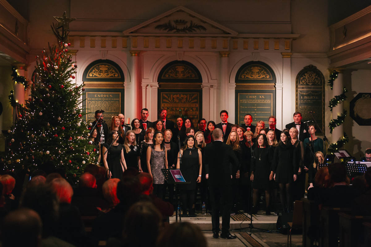 Vibrant choir performance in The Church in The Crypt, perfect for holiday events.