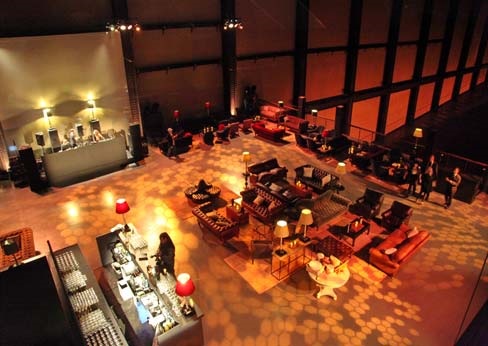 Turbine Hall at Tate Modern, stylish event venue with lounge seating for networking.